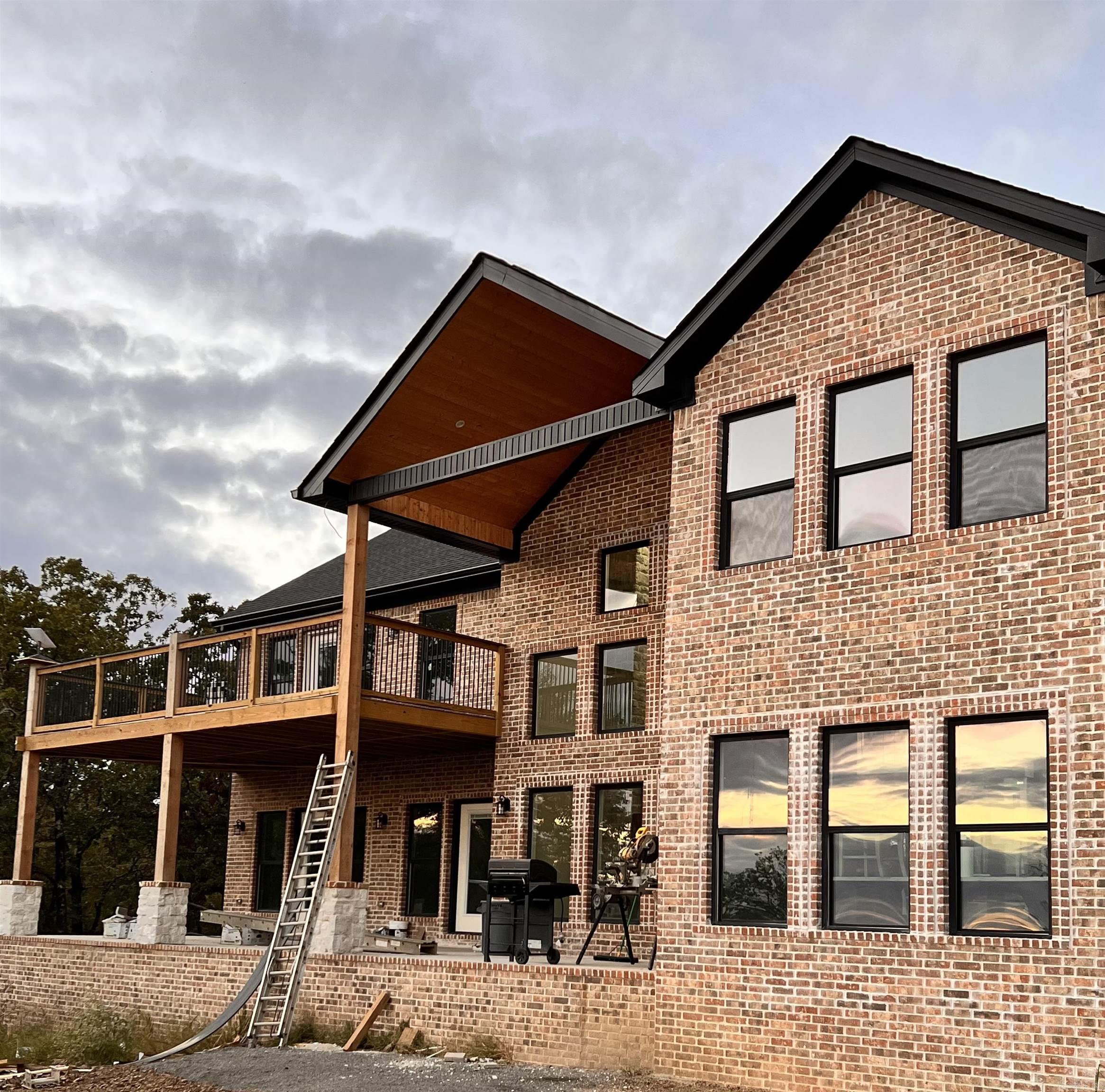 This custom-built new construction home in a gated community is a grand 5400 square feet of luxurious living space, set on a sprawling 4.85-acre estate, offering a truly incredible and breathtaking view. With 6 generously sized bedrooms and 5 elegantly designed bathrooms, this property exudes both opulence and functionality. The home also includes a full in-law quarters above the four car garage. This beautiful home was truly built with the intention of being a dream home but have unfortunately been relocated!   Currently under construction with opportunity to customize the remaining features over the next couple weeks with estimated completion date of December 15th, 2023!  Measuring encouraged.