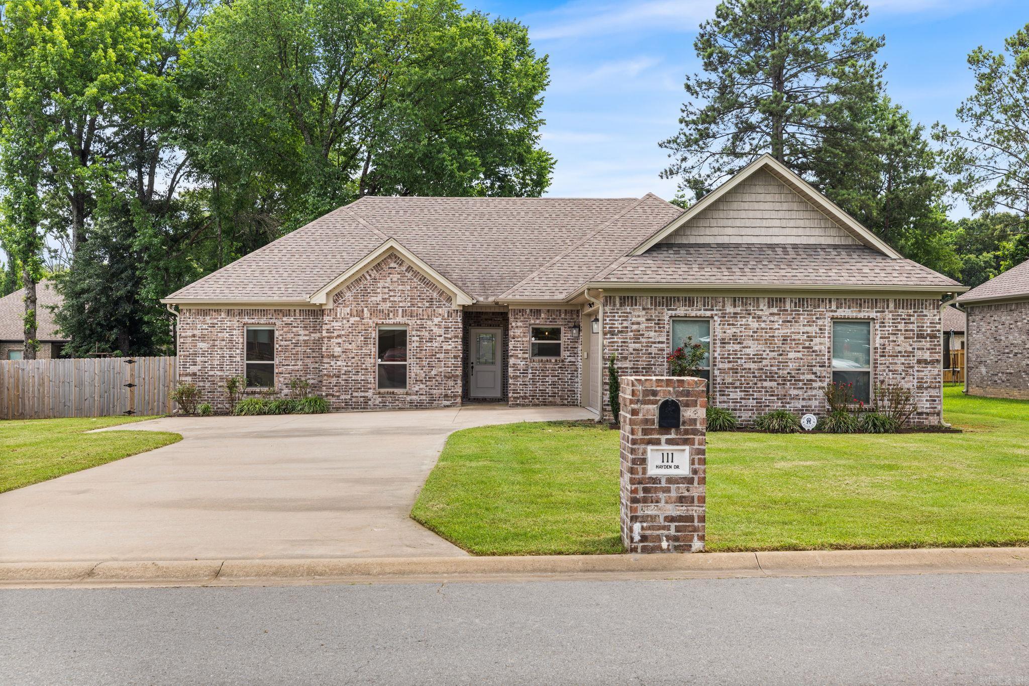 Beautiful newer construction home in the desirable Hidden Valley Estates subdivision! Built in 2021, this spacious home offers a ton of living space with 4 bedrooms, 2 bathrooms, and a desirable split-bedroom floor plan. The open-concept design provides plenty of room for gathering and entertaining, while the well-appointed kitchen flows seamlessly into the living and dining areas. The primary suite offers a private retreat, and the additional bedrooms provide flexibility for family, guests, or a home office. Situated on a generously sized lot with a two-car garage, this home combines modern finishes, functional design, and a convenient Beebe location close to schools, shopping, and Highway 67/167 access. Don't miss your opportunity to make this beautiful property your next home!  Certain images have been virtually staged to showcase the home's potential layout and design possibilities. Actual rooms may be unfurnished, and furnishings depicted are for illustrative purposes only.