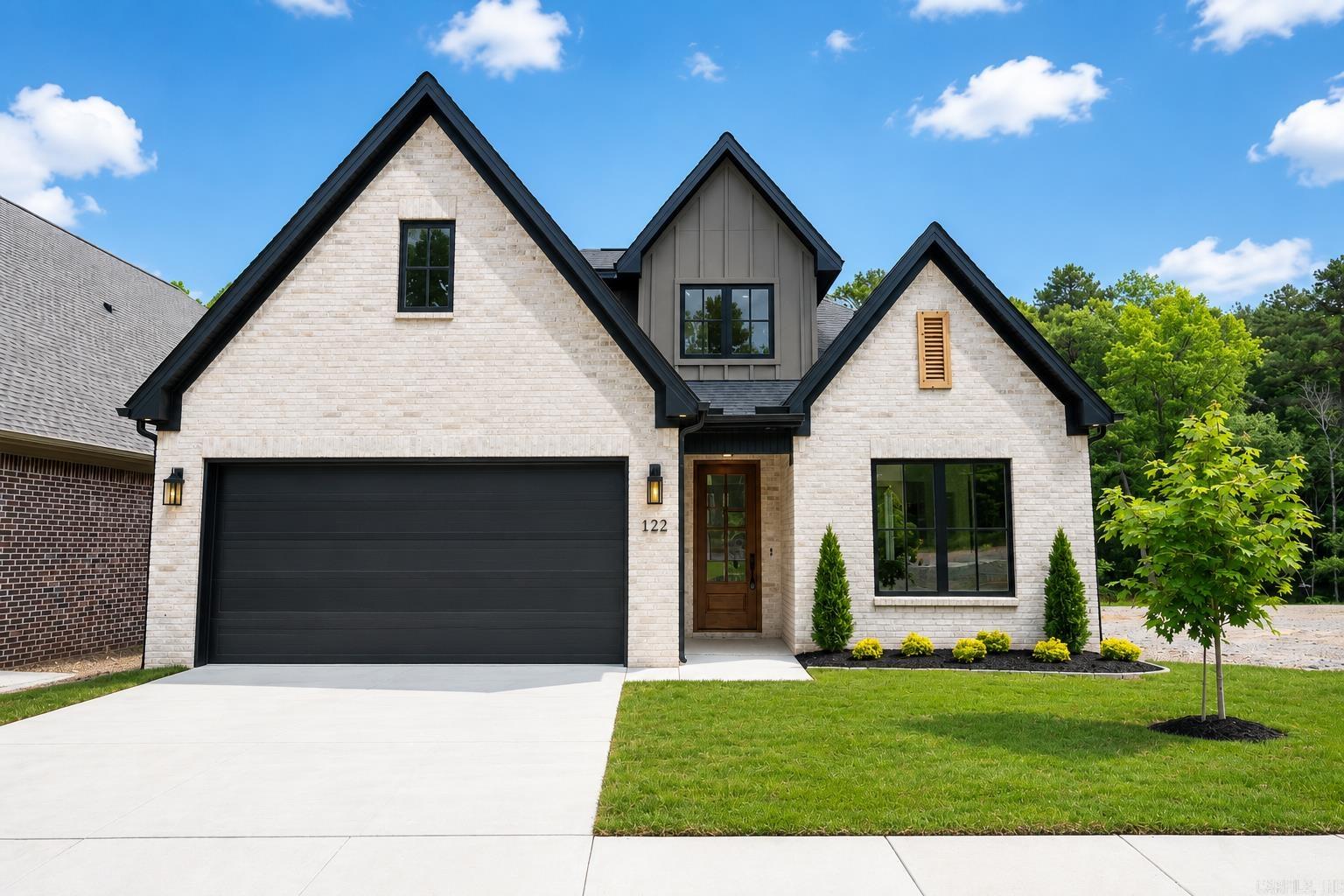 Beautiful new construction located at 122 Kinley Loop featuring 4 bedrooms, 3 full baths, and a spacious bonus room with modern finishes throughout. This thoughtfully designed home offers an open-concept layout, stylish fixtures, and abundant natural light. The kitchen is equipped with a gas range, perfect for cooking and entertaining, along with a gas water heater for added efficiency. Additional features include a separate dining room and a spacious laundry room complete with lockers and extra storage closet space. Two car garage with closet storage in the garage. The home is wired for low voltage monitoring and security installation. The private backyard backs up to peaceful green space, creating a serene setting with added privacy. Located in a desirable neighborhood with amenities including a community pool, park, and pickleball court. Conveniently located near Costco Wholesale, Kroger, and The Promenade at Chenal for shopping, dining, and everyday convenience. A perfect blend of comfort, functionality, and modern living.
