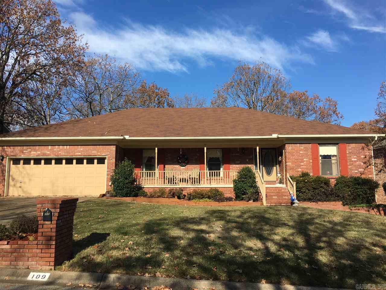 Clean custom one level on inviting flat lot.  Covered front porch leads to formal dining, large utility with sink, oversized kitchen with double ovens.  Master with spa tub and his/hers closets.  Huge den with brick wbf.  Enjoy the sunny days in the heated and cooled sun room overlooking large deck and pergola and lovely landscaped backyard.  Split floorplan.  Front bedroom with sitting area for reading, workout or office!  Real wood doors.  Roof 2012.  Estate as-is, but priced to sell!