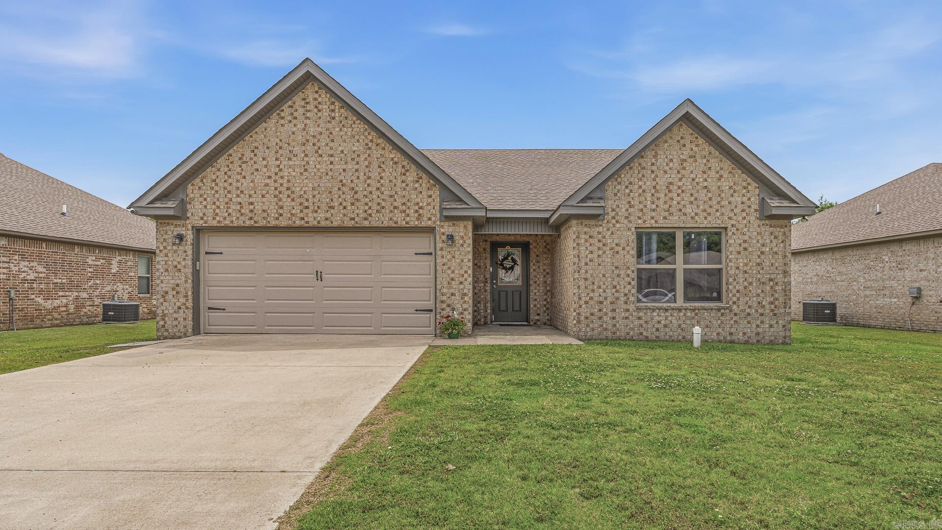 The words Move-in ready get thrown around a lot...but THIS one actually means it! 3 bedrooms, 2 bathrooms,Split floor plan, Granite Countertops, Stainless Appliances, Oversized pantry, Huge fenced backyard, All brick exterior. From the acid-stained floors to the spacious primary suite and backyard made for summer nights, this home just feels GOOD the second you walk in. And lets be honest...finding a clean, stylish home in Brookland School District with this much charm? Is Hard to beat!!