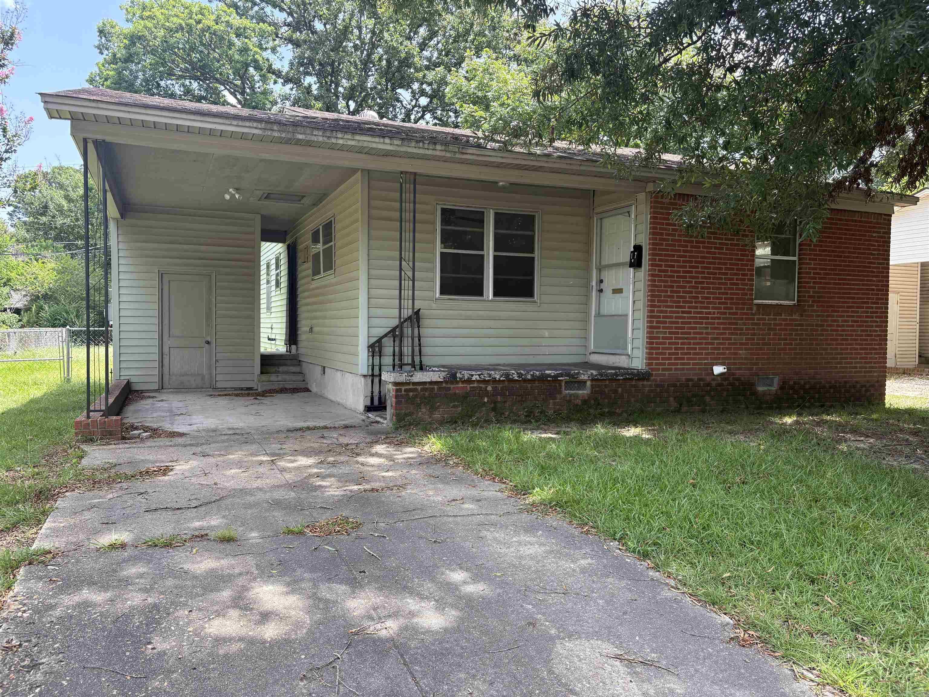 Opportunity awaits!! This property is an excellent opportunity for investors, flippers, or buyers looking for a fixer-upper with plenty of potential. Conveniently located near schools, shopping and other amenities. 3-bedroom, 1 bath, 1,128 heated square feet on a spacious 1/2-acre lot, providing plenty of room to enjoy the outdoors or add your own improvements. Beautiful hardwood floors, a new stove and new water heater give you a great start on renovations. The property is being sold AS IS. Bring your vision and transform this home into something special.