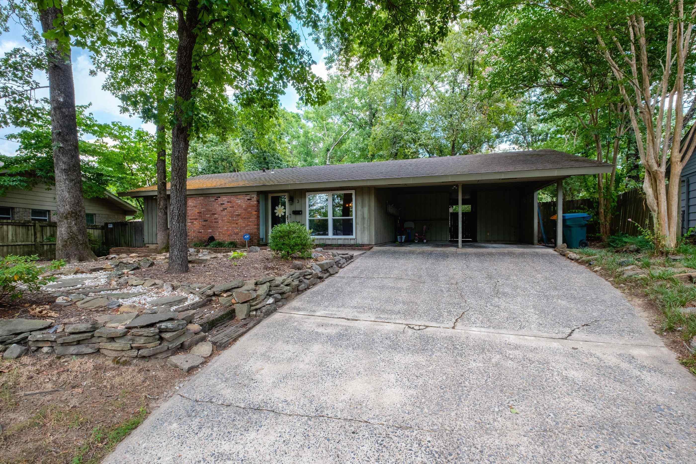 Precious house in Midtown! 3 bed, 2 bath, separate dining room, oversized living room with vaulted ceiling, outside storage room, and wonderful backyard.