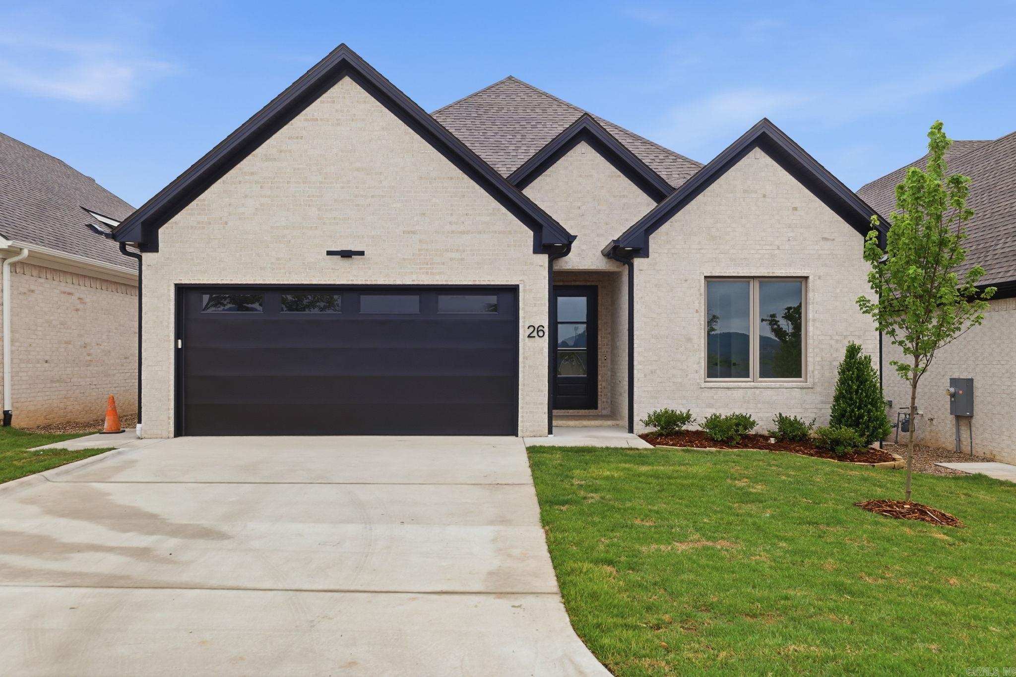 Welcome to Mountain Brook, West Little Rock's newest neighborhood, conveniently located off Highway 10 behind The Ranch. This single-level residence beautifully combines craftsmanship and design, featuring four bedrooms and three full bathrooms. The primary suite serves as a sanctuary with a spa-like bath, soaking tub, oversized walk-in shower, and a custom closet. The living room has soaring 12' ceilings and a floor-to-ceiling tiled fireplace. At the heart of the home is a chef’s kitchen equipped with quartz countertops, custom cabinetry, a dining area, and a fully functional pantry. You can also enjoy evenings by the outdoor fireplace. Please contact the listing agent to schedule your private tour.
