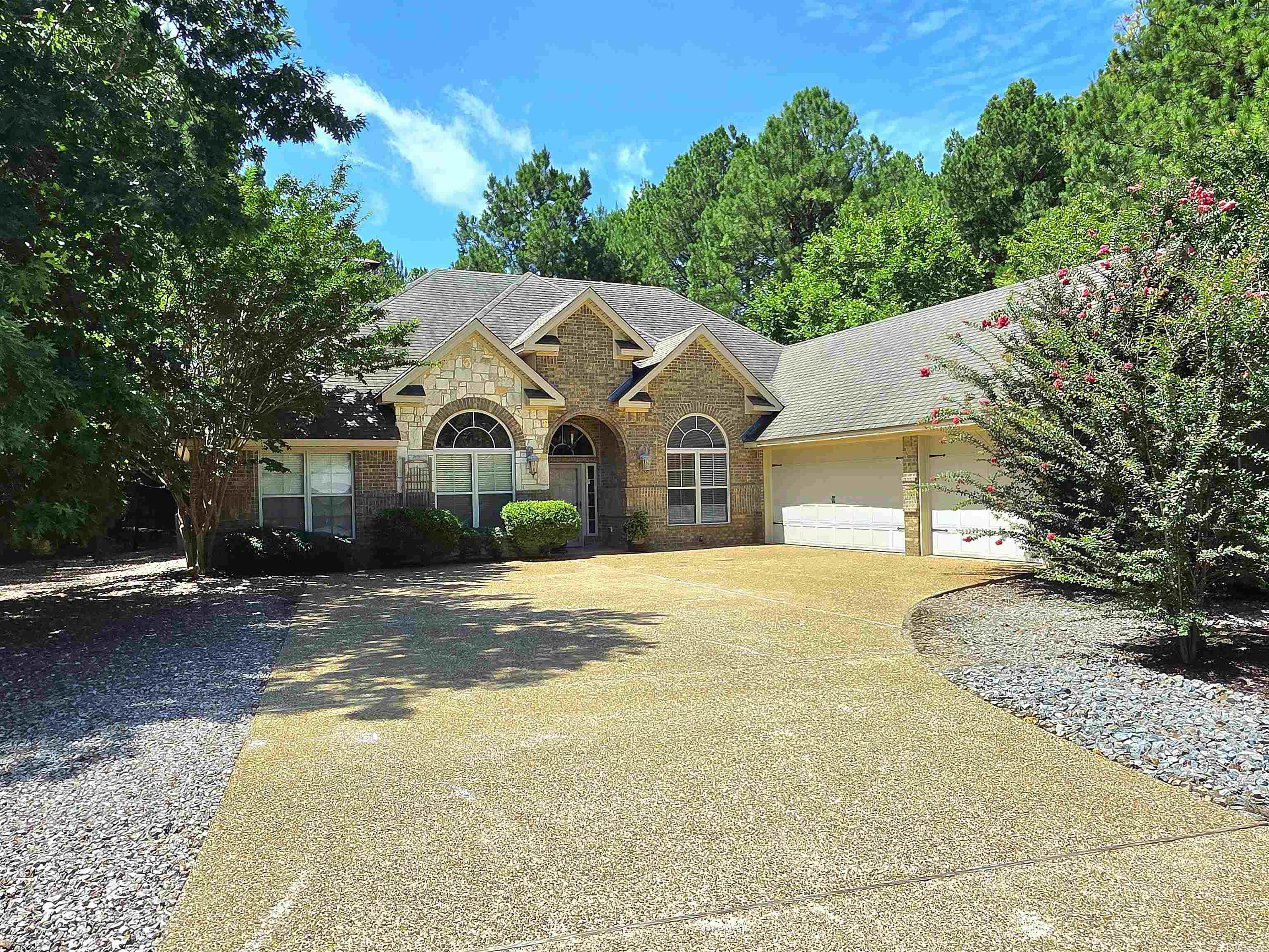 Exceptional one-level home in the desirable Isabella Golf Course area offering 2,745 h/c sq. ft. with 3 bedrooms, a dedicated office, and a beautifully balanced mix of wood floors, carpet, and tile. The spacious kitchen features granite counters and a breakfast area, while the formal dining room provides an elegant setting for entertaining. High-volume ceilings, crown molding, and thoughtful custom touches run throughout. The split-bedroom layout places guest rooms on one side of the home and the large primary suite on the other, complete with a tray ceiling, generous bath with tub and walk-in shower, private water-closet area, double lavatory, and custom built-in shelving in the closet. A large heated/cooled sunroom overlooks the private backyard, creating an inviting year-round retreat. Additional highlights include 2½ baths, a gas fireplace, and a 3-car garage. Exterior finishes include brick, stone, and vinyl. Refrigerator, washer, and dryer are included in the price of $439,200.