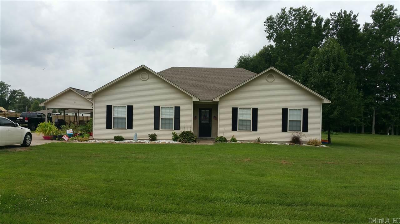 Cookout & have your friends over between the covered patio & carport there's room for all. Home has bonus room that was a 1 car garage  been that is insulated has H/A, wall is being insulated & overhead door tracks are being removed. Outside storage & electric fence underground for pets. Nice home sitting on approx 1.2 acres.