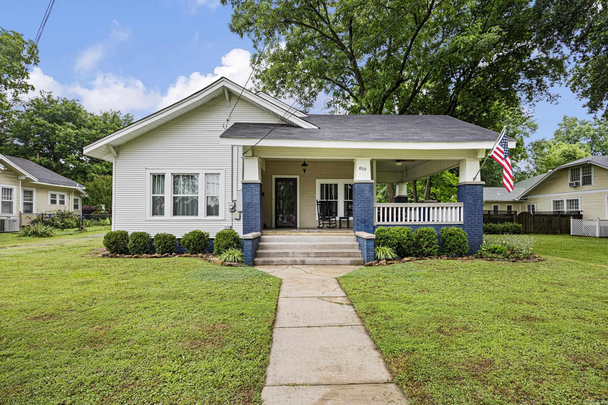 Step into timeless charm with this beautiful historical home located on a gorgeous lot in the heart of Morrilton. Featuring 3 bedrooms, 2 bathrooms, and a versatile bonus room, this home offers the perfect blend of character and comfort. Original wood floors add warmth and historic appeal, while new carpet provides updated comfort in select spaces. From the unique architectural details to the inviting atmosphere, this home is full of personality and charm. Enjoy spacious outdoor surroundings with plenty of room to relax, entertain, or garden. A rare opportunity to own a home with history, character, and modern updates all in one.