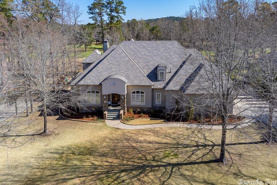 Spectacular Golf course home, Beautiful inside & out.  Beautifully crafted wrought iron fence for the home of your dreams!  Gorgeous decor & exceptional family floor plan. Great entry, large family living + fireplace and formal dining. Wonderful kitchen & breakfast area with exceptional views. Adj large Den. Great master suite with sitting room and luxury spa inspired bath. Wonderful terrace overlooking landscaped grounds & golf course. 3 car garage.