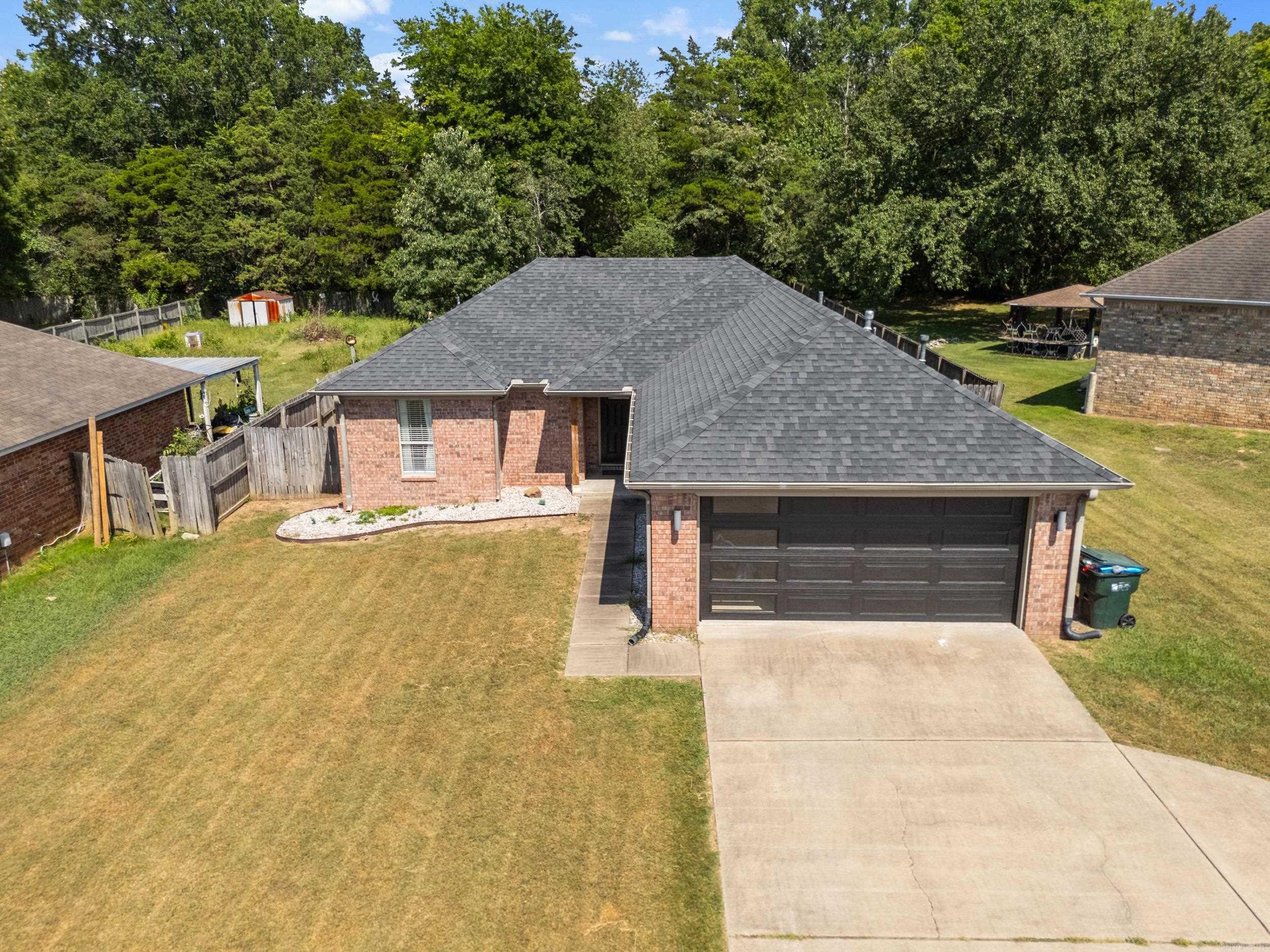 Welcome to a home where the hard work has already been done. With major updates completed and a central Conway location, you'll enjoy easy access to I-40, shopping, dining, parks, and many of the area's everyday conveniences. Inside, stained concrete and tile flooring provide both style and durability, making the home easy to maintain. Recent improvements include a new HVAC system and furnace in 2025, a water heater replaced in 2023, and a roof replacement in approximately 2021. Additional improvements include updated bathroom cabinetry, countertops and hardware. With these major items already addressed, you can spend less time planning projects and more time settling into your new home. Step outside to a generously sized backyard with plenty of space for entertaining, gardening or pets. Whether you're looking for your first home, your next home, or an investment opportunity, this move-in ready property offers updated systems, practical features, and a location that keeps you close to everything Conway has to offer.
