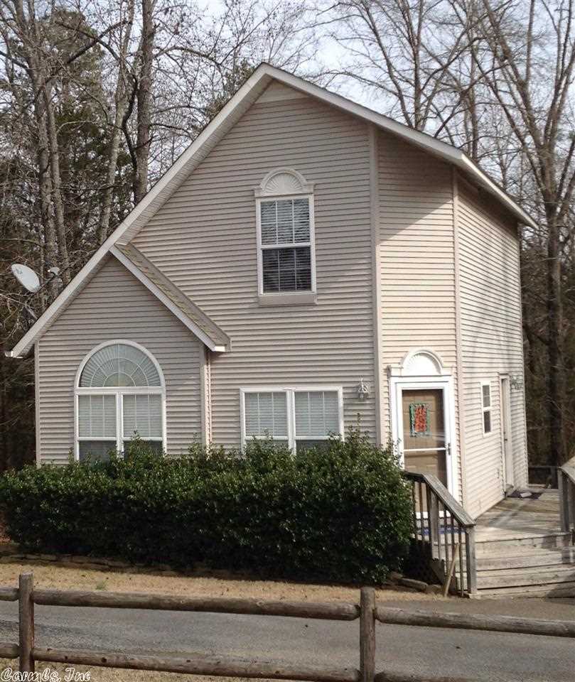 Perfect location, furnished, and just waiting for you. Remodeled in 2012, new fridge in 2013, new HVAC in 2014. 2 bed/2 bath with a loft area currently being used as a 3rd sleeping area with bunk beds. Large wrap-around deck for entertaining. Gated entrance to quaint, secluded neighborhood complete with storage unit for all your lake toys and lots of green space for enjoying the outside when not on the lake.  A golf cart ride away to Lacey's Narrows Marina.  You'll want to see this one.