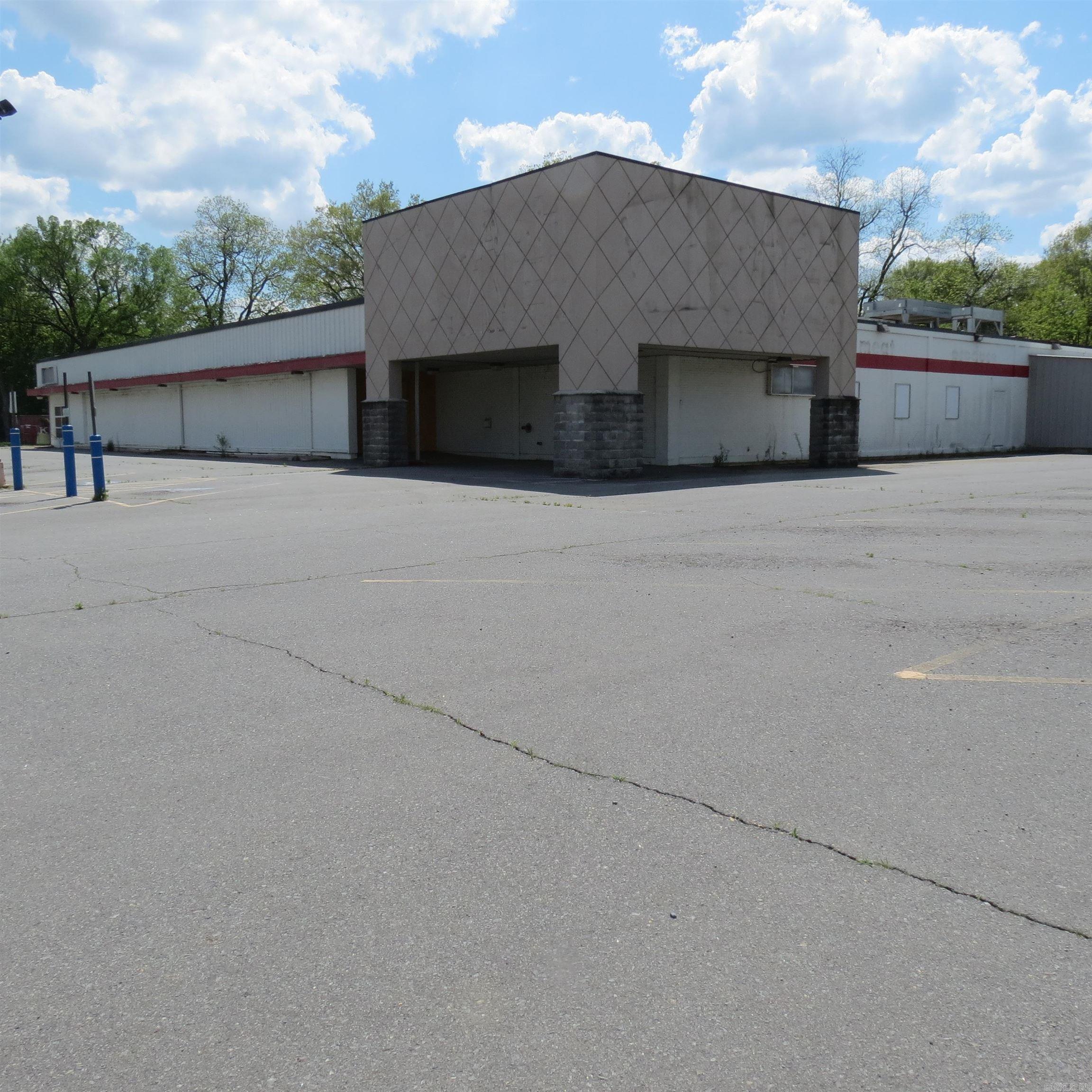 This property presents a unique opportunity for investors, developers, or owner-users looking to revitalize a proven site with flexible potential—ideal for discount retail, furniture outlet, fitness center, event space, or light industrial conversion. Wide-open floor plan easily adaptable for retail, showroom, or storage uses Existing infrastructure for food service or heavy utility needs (floor drains, walk-in cooler areas, loading dock, etc.) Ample on-site parking with easy ingress/egress  High traffic counts and strong local demographics Zoned for commercial retail or general business use.  Old CASH SAVER Grocery store.  Call today for more information.