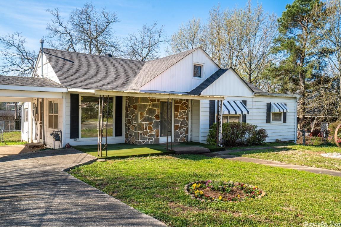 Motivated Sellers, make an offer...Location, location, location! This family home built in 1949 with 1802 sq. ft heated and cooled is WALKING distance from Oaklawn Racing and Casino Resort… It has great hardwood floors, a nice living area, kitchen, 4 bedrooms and 1.5 baths, sun room, laundry area AND a floored attic and unfinished basement…. Could be so much more living space!  It is on 3 lots with carport and extra parking spaces.   Plenty of room for your guests and a fenced backyard for your furry friends… whether as your family home or a racetrack hangout… soooo close to everything!