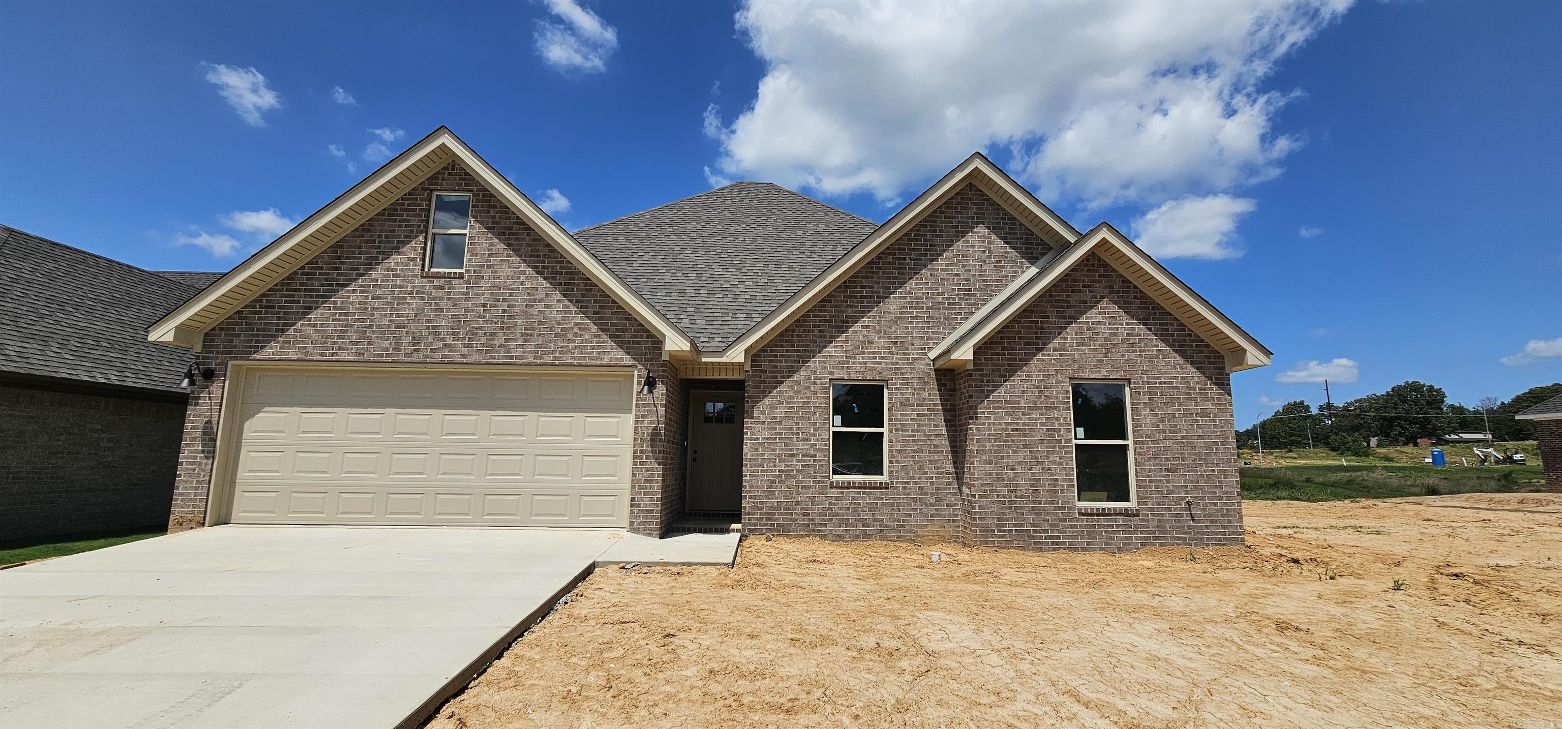 Now under construction in Sierra Hills! This all-electric, one-level home is designed with today's lifestyle in mind and is anticipated to be completed in the coming weeks. Offering approximately 1746 square feet, the floor plan features 4 bedrooms, 2 full baths, and a desirable split-bedroom layout. The spacious kitchen is planned with solid surface countertops and appliances including an electric range, microwave/vent hood, dishwasher, and disposal. Luxury vinyl plank flooring will extend throughout the home, creating a cohesive and low-maintenance living environment. The primary suite will feature a private bath and two walk-in closets, while the additional bedrooms provide flexibility for guests, or a home office. A laundry room, patio, double garage, and low-maintenance brick and vinyl exterior complete this exciting new construction opportunity.
