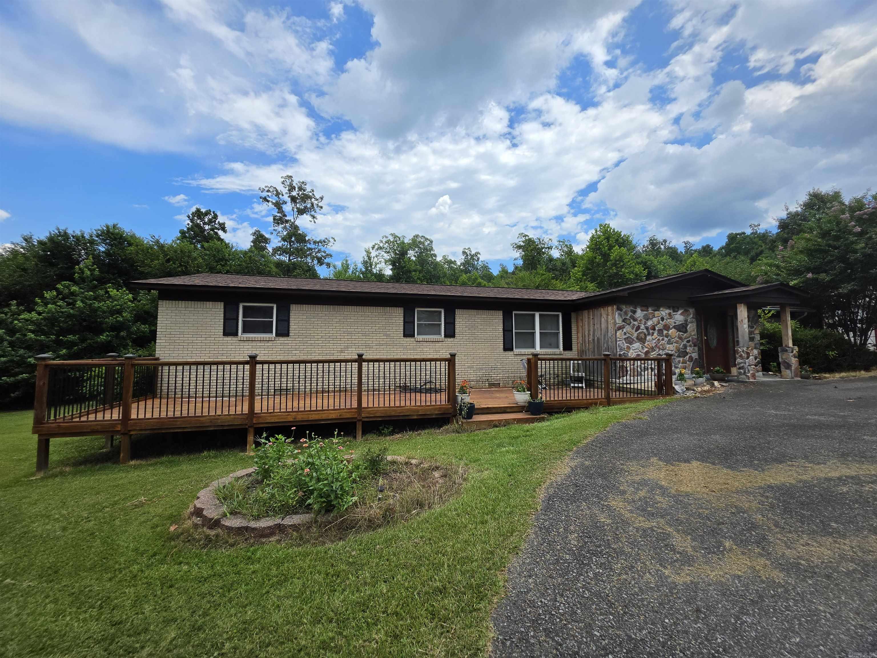 Huge Shop/Garage and Charm! Come check out this FLSD home with all the country character you could want. The property has a large corner lot, a large deck and a practice court for the kids. It even boasts a huge spa like tub for mom! You will love the spacious kitchen area with a large pantry for that growing family. This perfect Home Sweet Home is just what you imagined with the farmhouse charm with vaulted rustic ceilings and updated stainless steel kitchen and granite countertops! New roof in May 2025. Put this one on the list. Call today!