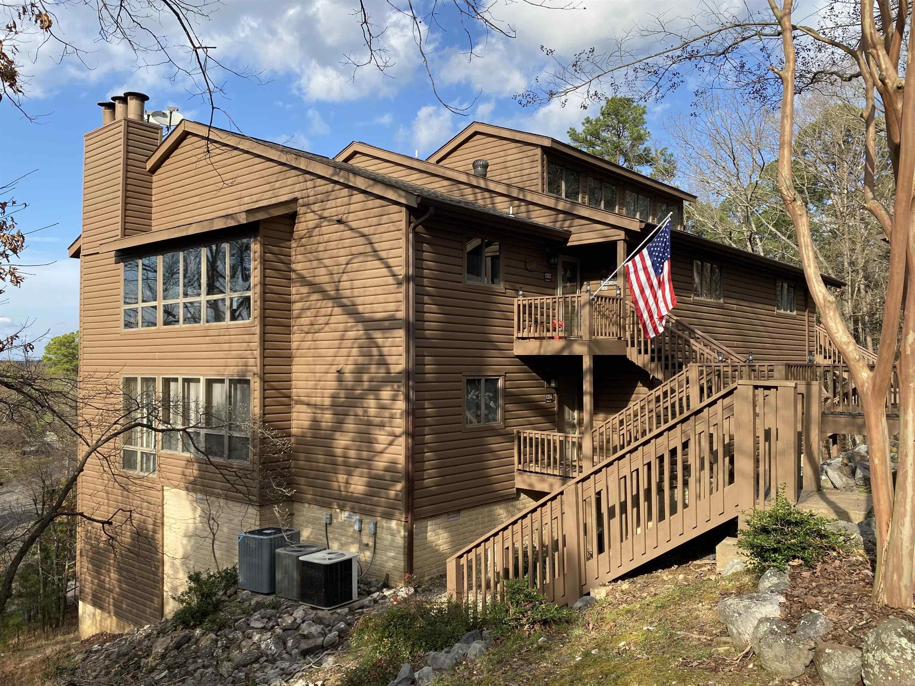 You will love the layout and the view of this Lake View condo at Mountain Harbor Resort. This fully furnished condo has 4 bedrooms and 3 baths making it ideal for hosting family & friends or as an income generating property.  2 bedrooms and 2 baths are located on the main floor and the 3rd and 4th bedrooms are located down the stairs along with a full bath and chalkboard wall for the kiddo's. The open & welcoming layout provides plenty of space for everyone to gather and the 2 large, covered decks are perfect for that morning coffee or watching the evening sunset.  Whether you are searching for a full-time residence, weekend escape or investment property you will want to see this one. Don't wait, call today.  Boating season is here!