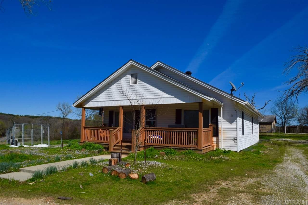 Searching for a starter home with acreage near DeGray Lake in Bismarck, Arkansas?  This 2 Bedroom 1 Bath older home has been remolded and is ideal for anyone looking for a home near the lake off Highway 7.  This would be a perfect vacation rental, starter home, or for anyone looking to downsize and be near DeGray Lake or the DeGray Lake Resort & Golf Course!