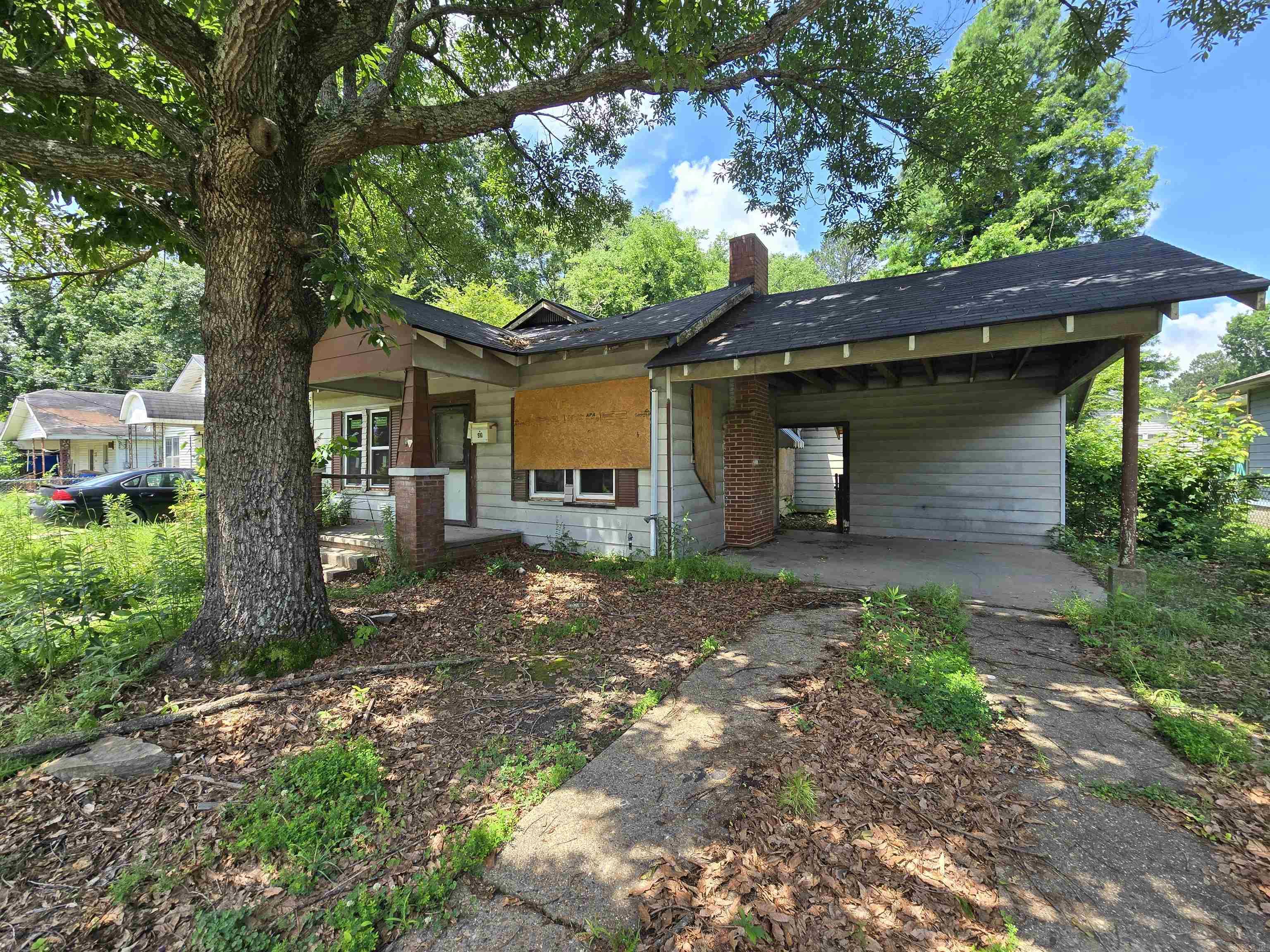 Who's ready for their next investment project? Who likes easy flips? This home is already halfway done! It has been taken down to the studs and has been given a new roof, plumbing, HVAC system, updated electrical, subfloors, windows, sliding patio door, and framing. Creative financing is considered. 3 bed, 1 bath, fireplace, fenced back yard with oversize carport. Come take a look!