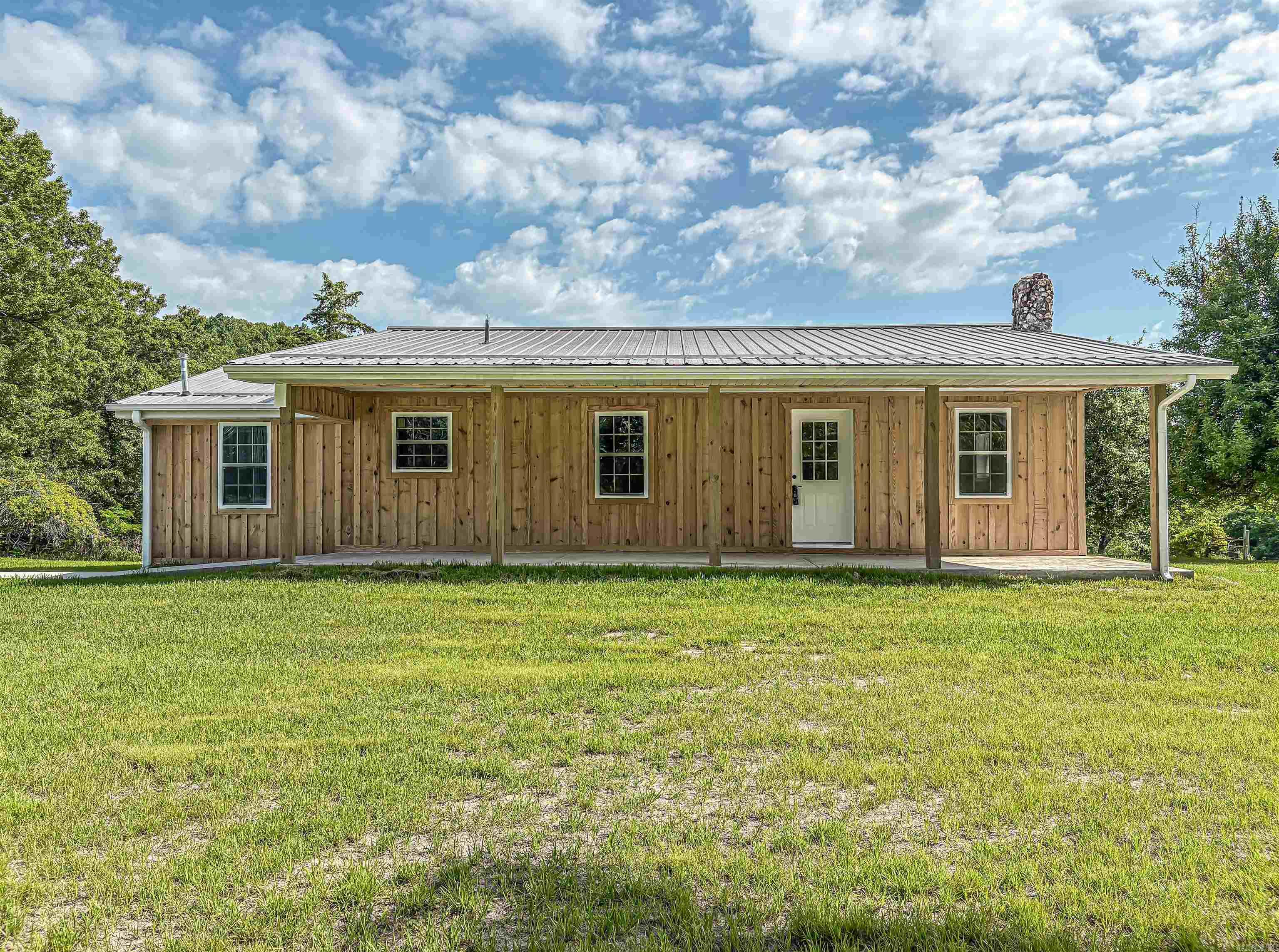 Completely remodeled 3-bedroom, 2 bath home nestled in a peaceful farm-like setting! This charming property offers the perfect blend of modern updates and country living. Features include a spacious 2-car garage with an additional upstairs bedroom and bath—ideal for guest accommodations or even a potential rental income opportunity. Enjoy the tranquility of open surroundings while still having all the comforts of a beautifully updated home. A rare find with flexibility, charm, and endless possibilities!