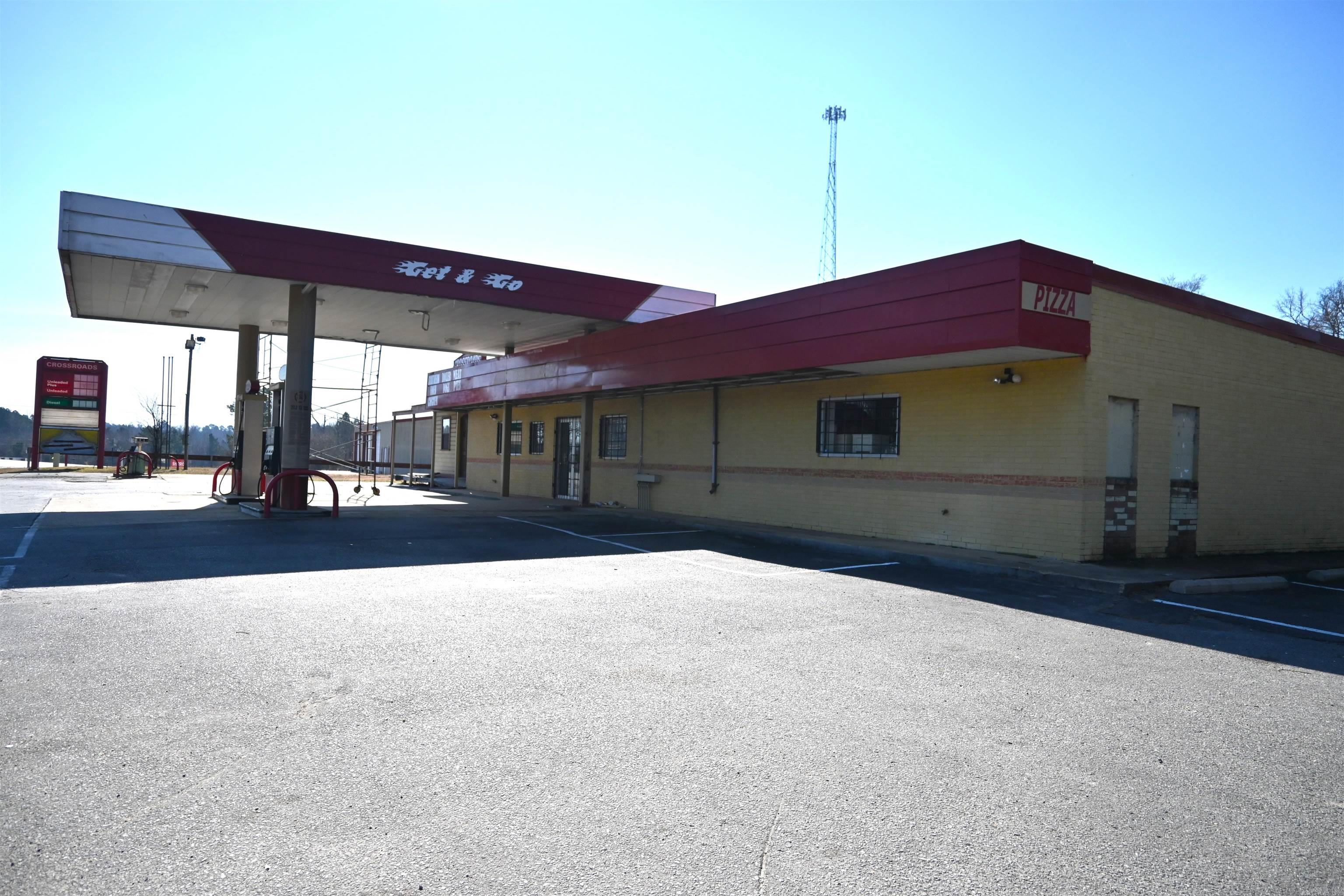 Turn-Key Commercial Opportunity - Newly Remodeled Gas Station w/ Food Equipment included! Great opportunity to own a remodeled commercial property that was formerly an operational gas station, complete w/ food service equipment and updated interior and exterior finishes.  This property is ideal for an owner-operator or investor seeking a business with a great location. The building was in the process of being remodeled with clean and more modern looks.  Being sold AS IS.  This building location has excellent visibility and accessibility w/ high traffic location and Ample parking for customers. Contact listing agent for questions and showings.