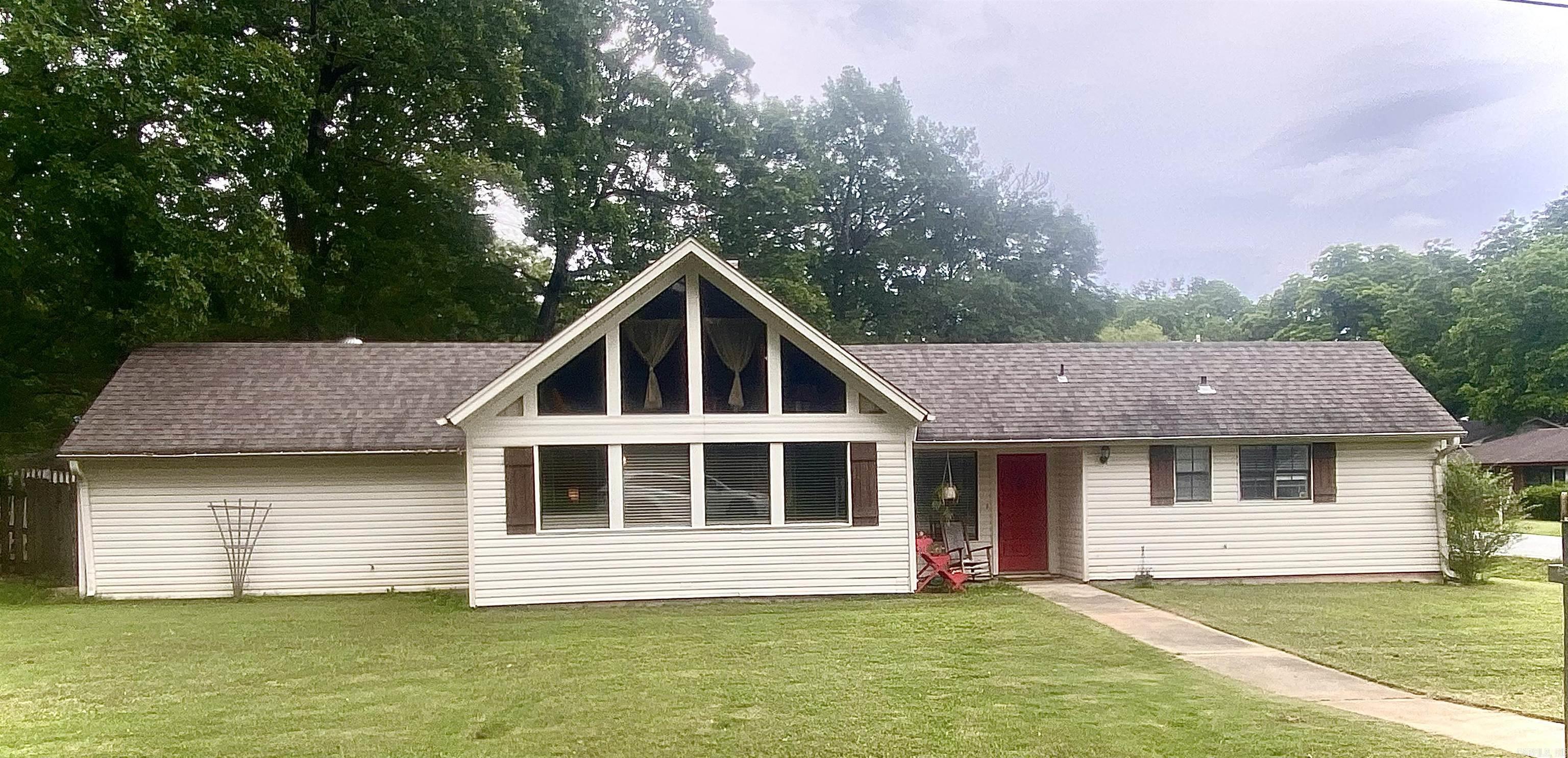 Opportunity awaits you! Reduced price and  SELLER CONCESSIONS AVAILABLE UPON NEGOTIATION!! Located North of town just moments away from the Monticello library, post office, walmart and many more local shopping attractions . This 3 bed, 2 full bath home also includes a loft upstairs used as a great bonus room for hobbies, rec-room, storage, and more.  The master bedroom includes full bath, and sliding glass door to private backyard patio. The home offers open concept living with lots of natural light, and vaulted ceiling. Also includes a wood burning fire place in the living area for those cold winter nights! This property is great for entertaining with friends and family on the bonus patio off of the carport and the large fully fenced in backyard with storage room and fire pit! So much to love about this home!! Don’t let it slip away! Make your appointment today!