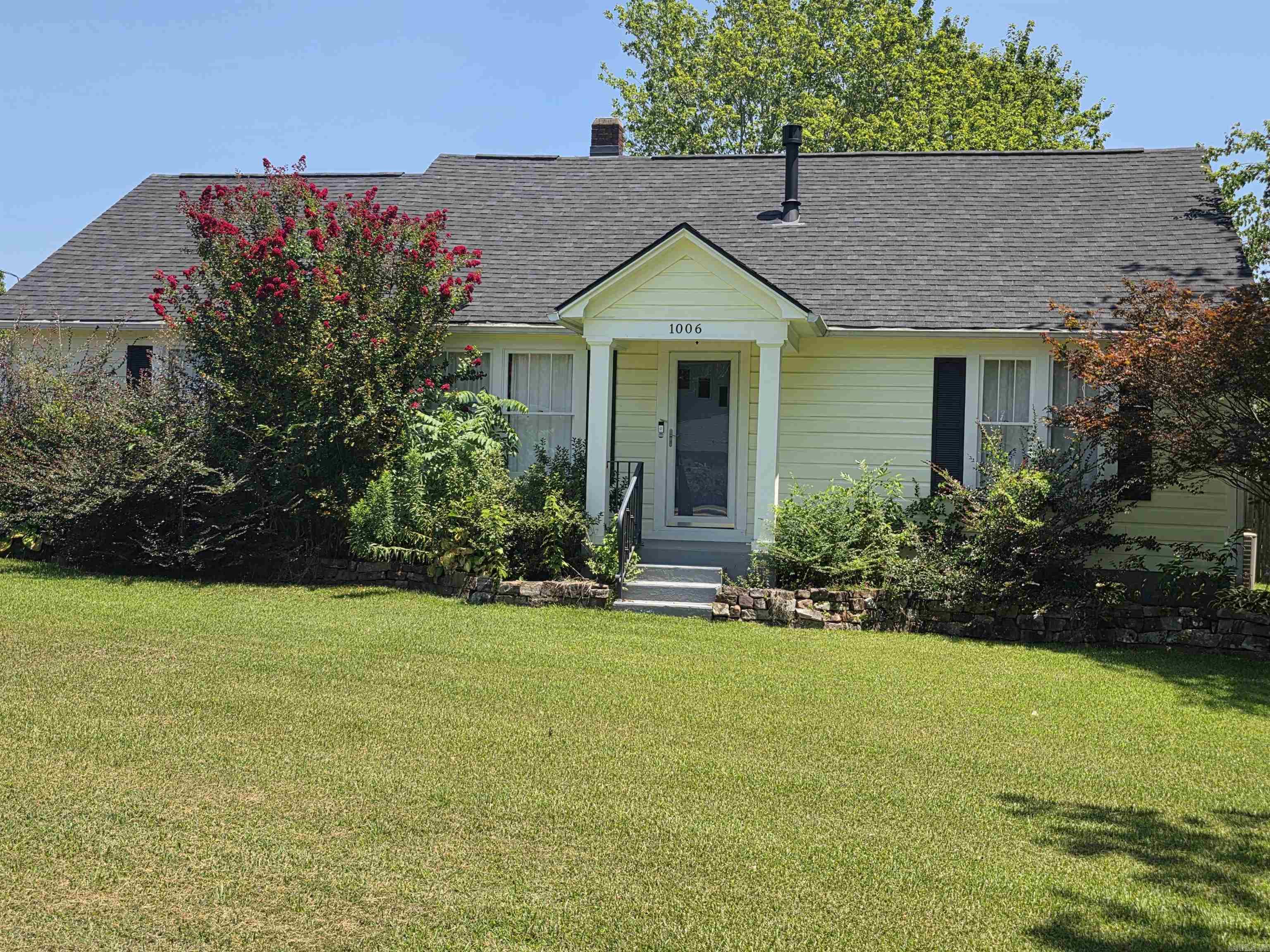 Tastefully updated home with old school charm! Hardwood floors and large windows that let the sunshine in. Brand new roof in 2026. Upstairs is a bedroom and more storage. Updated kitchen & cute laundry room! Separate garage has even more storage with room for hobbies or your special projects. Deck outback is great for entertaining, along with the fenced back yard. Wired for generator and 30 amp RV hook-up.