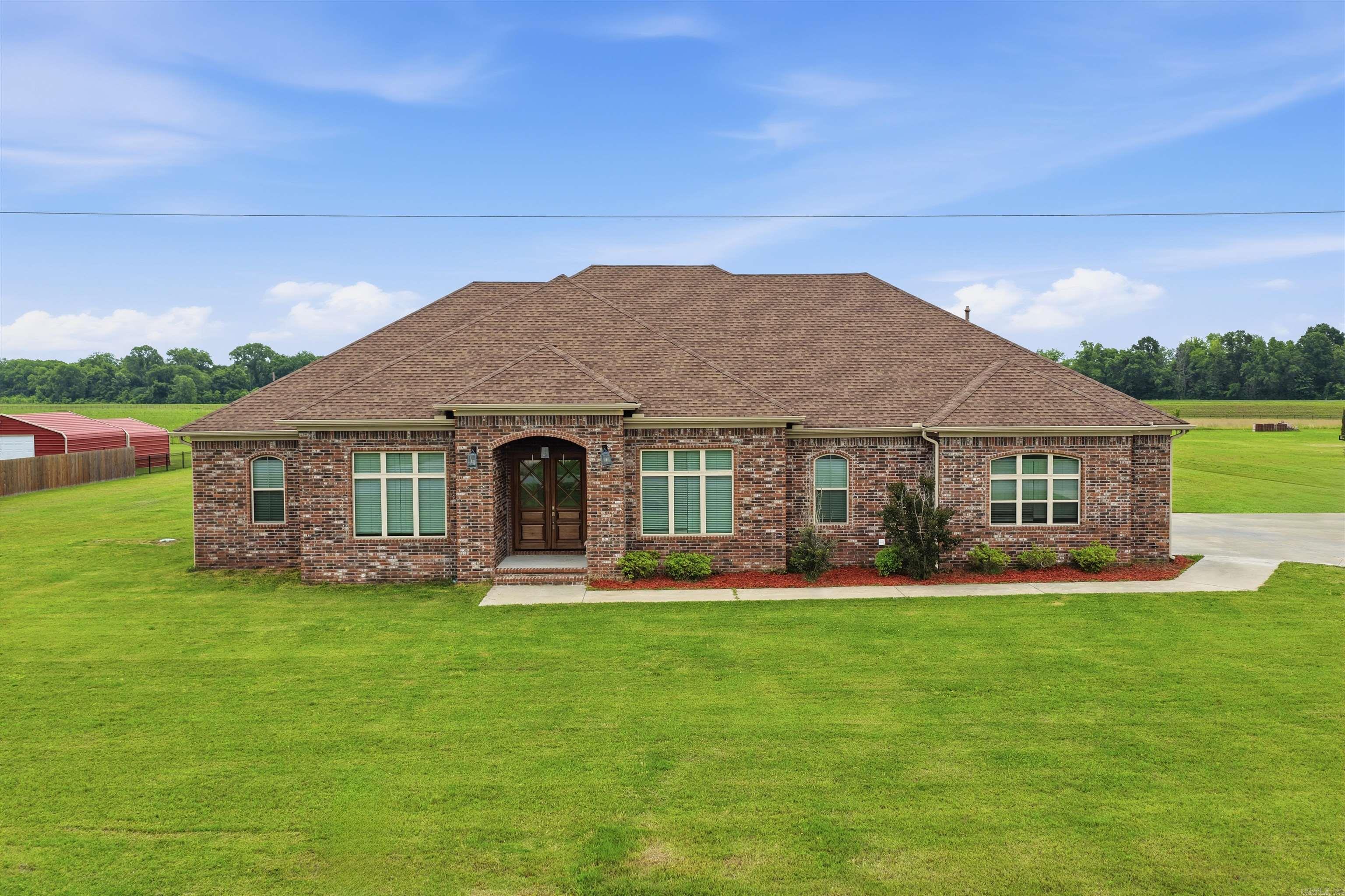 Welcome to your own private retreat in the gated community of Ashley Downs in Scott. Situated on 1.72 acres, this beautiful home offers the perfect blend of peaceful country living and modern style. Featuring 3,319 square feet, the home includes 4 spacious bedrooms, 3 full baths, and 2 half baths, providing plenty of room for family, guests, and entertaining.  Inside, you’ll find modern finishes throughout and a thoughtfully designed layout that offers both comfort and functionality with a split floor plan.   The generous living spaces are filled with natural light, creating a warm and inviting atmosphere while still offering plenty of room to spread out.  Step outside and enjoy the privacy and tranquility of your expansive 1.72-acre lot. Residents of Ashley Downs also enjoy the benefits of a gated subdivision with access to private fishing, making it easy to relax and enjoy the outdoors just moments from your front door.  With beautiful surroundings, modern updates, and the peace of a quiet, gated community, this property truly offers your own little piece of paradise.