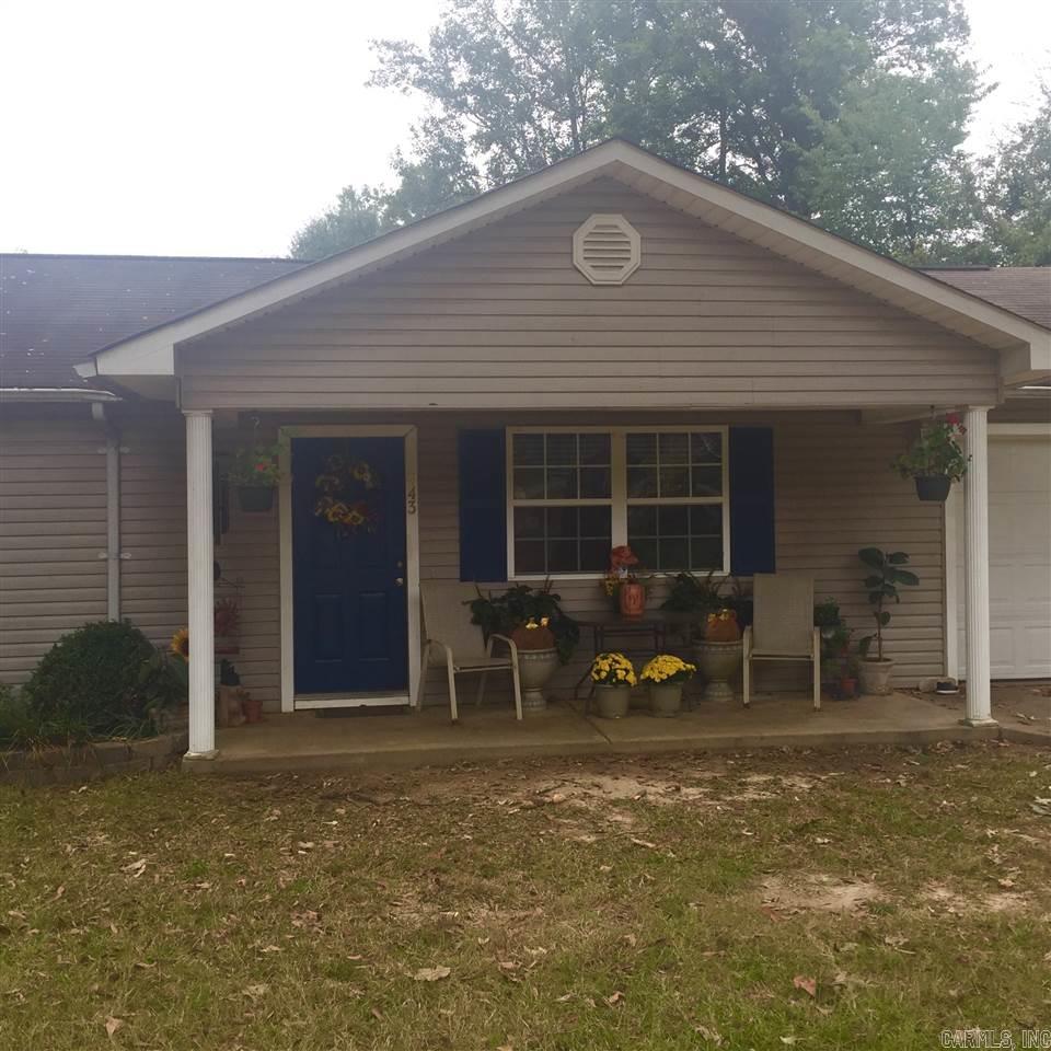 Great 3 bedroom 2 bath home on .76 acre!  This home is immaculate and nicely decorated!  Open floor plan with new laminate floors and exposed beam.  The kitchen is the perfect size with lots of cabinets!  You will enjoy the private back yard!  Take a look at this one, you won't be disappointed!  Fresh paint and new flooring throughout the home. Stove, dishwasher and garbage disposal all 1 year old, water heater 6 months old.  Refrigerator can stay with the home -2 years old.