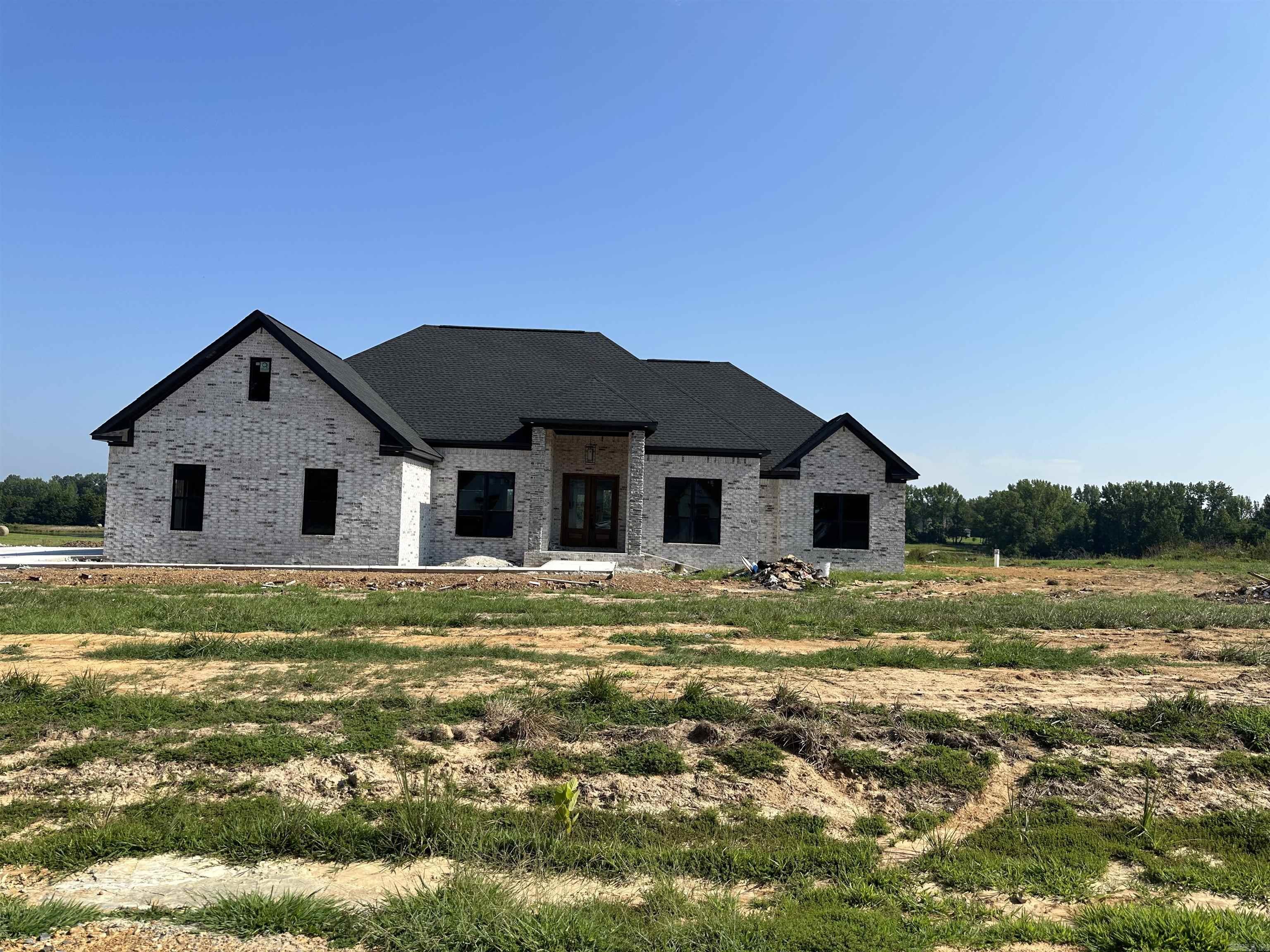 Come see this beautifuly built new construction home sitting out in the country, on a quiet dead end cul-de-sac road. The spacious open floor plan of this 4 bed 2.5 bath house is perfect. The columns out front are sure to make a statement when you drive by. The home features a unique granite through out, custom tile shower in the master, free standing soaking tub in the master, large covered back porch, and a three car garage. ASPHALT ROAD COMING SOON.