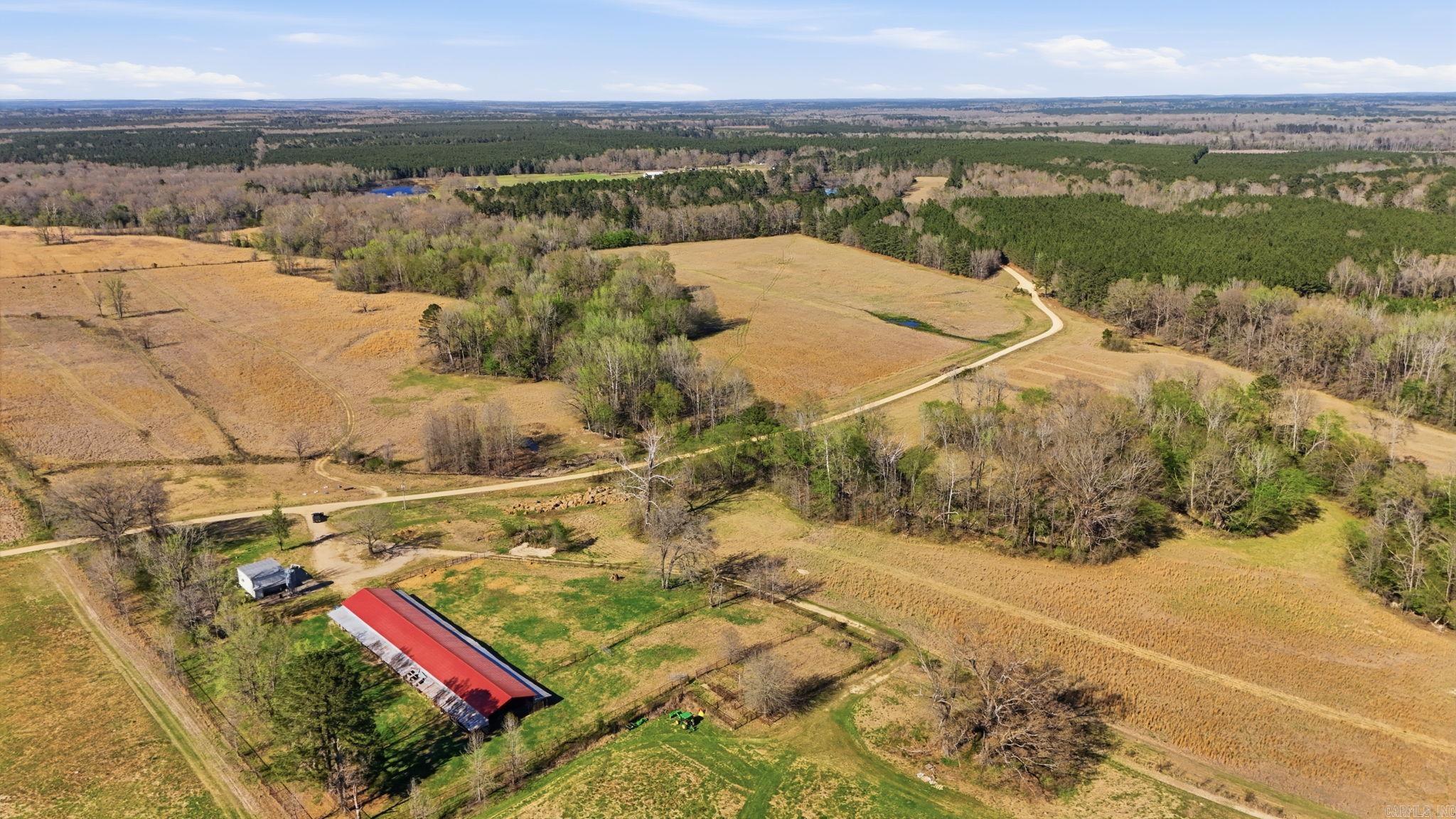 130.08 acres ready for farming cattle, hunting, or even building your dream home.  With a working well with new pump and components, electric at the shop, and a perc test and permit pulled for a 3/2 barndominium, this seller has done the work for you.  Also fenced and ready for your animals. Also included: cattle working/sorting pens and grain bin. Agents see remarks for financing option for beginning farmers and more information on personal property.**land apps(onX,Landid) do not show the correct property lines** please see survey.