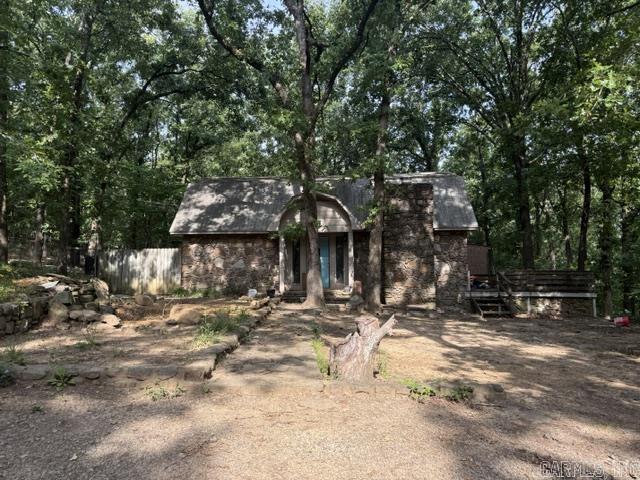 Investment property outside of city limits on 1.05 acres.   Renovations were started and then abandoned.  It sits on a beautiful piece of property right off Highway 5.  Call to see it today!