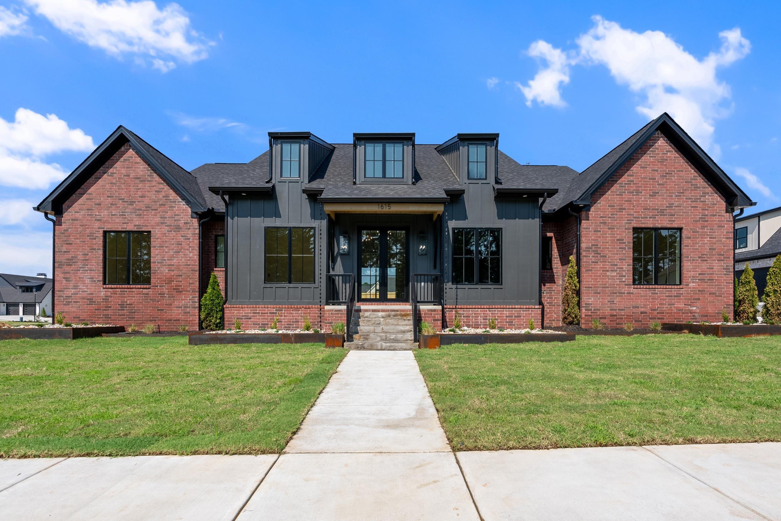 This stunning custom-built new construction home in Lands End subdivision offers 4 bedrooms, 4 1/2 baths w/office & upstairs bonus room. The grand foyer opens to a large open-concept living area w/vaulted ceilings, beautiful suspended light fixture, stone fireplace flanked by built-ins & glass doors leading to the outdoor entertaining space. Chef’s kitchen features large center island w/seating, custom cabinetry,high-end stainless appliances, 6-burner gas range w/ pot filler, coffee bar, walk-in pantry, quartz countertops & under-cabinet lighting. Adjacent dining area is highlighted by statement lighting.The primary suite includes a vaulted ceiling, ample natural light, a spa-like en-suite bath w/ a separate soaking tub, oversized walk-in shower, dual vanities, & a custom walk-in closet. 3 additional bedrooms on the main level are served by 2 full baths, plus spacious laundry room w/ built-in pet accommodations. Upstairs, the bonus room & full bath provide a flexible living space. Outside the expansive covered patio w/outdoor kitchen & wood-burning fireplace are perfect for entertaining. Custom steel raised landscape boxes & 3 car garage.