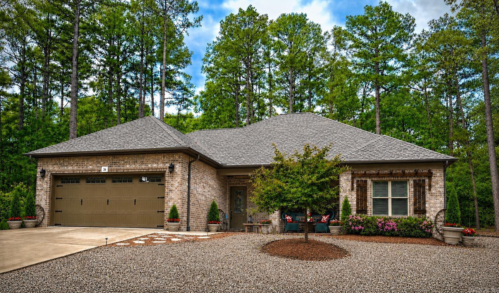 This beautifully maintained home is "move in ready" and offers the perfect combination of quality, comfort, room to entertain, and outdoor living space! It's located in a peaceful and friendly neighborhood, with level streets where you can take a morning walk or ride your bike. Step inside the open-concept floor plan to enjoy the natural light and elegant finishes throughout. The kitchen, bathrooms, and laundry room all have stunning black crystal granite counter tops with a leather finish. The window treatments, TV over the fireplace, kitchen appliances, washer, dryer, and refrigerator in the garage all convey. The stunning and private backyard will have you wanting to spend all of your time outdoors. The landscaping is well tended to and has color changing lights on the fence. There is a stone pathway leading to a pergola with a permitted portable firepit. It has an 8-foot permitted privacy fence that is hard to find in HSV. This makes the backyard a private oasis to enjoy bird watching, reading a book, or spending time with family and friends. One of the best features is the 3% VA assumable loan for qualified buyers. Don't miss your opportunity schedule your showing today!