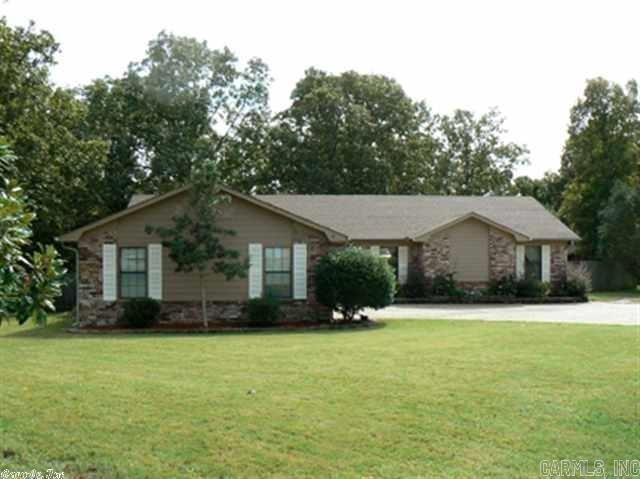 Spacious room-for large family.  Big closets HUGE laundry room, half acre yard with gazebo and storage building.  Very private and no through traffic (on cul de sac).  Close to freeway and, of course, Walmart!! Master has jetted tub/shower combination and two walk in closets.  Very nice home!  Wood burning fireplace, too! No smoking permitted and pets permitted with restrictions.