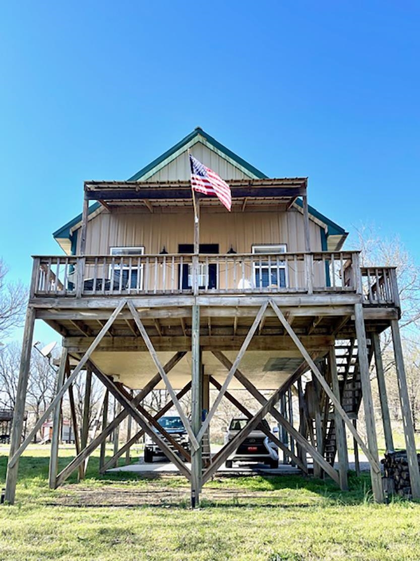 Spend your days playing on the Spring River in Hardy Arkansas.  This charming 2 bed, 1 bath cabin offers the perfect escape for family and friends and let’s not forget the quaint loft area perfect for the kids to have their own hide away.  This cabin has been updated and is turnkey with the option to acquire with furnishings. Stunning views, access to Spring River, and minutes from downtown Hardy Main Street for shopping and sweet treats.  Whether you are looking for a place to call home, a space to retreat to, or an investment property this one is worth checking out!