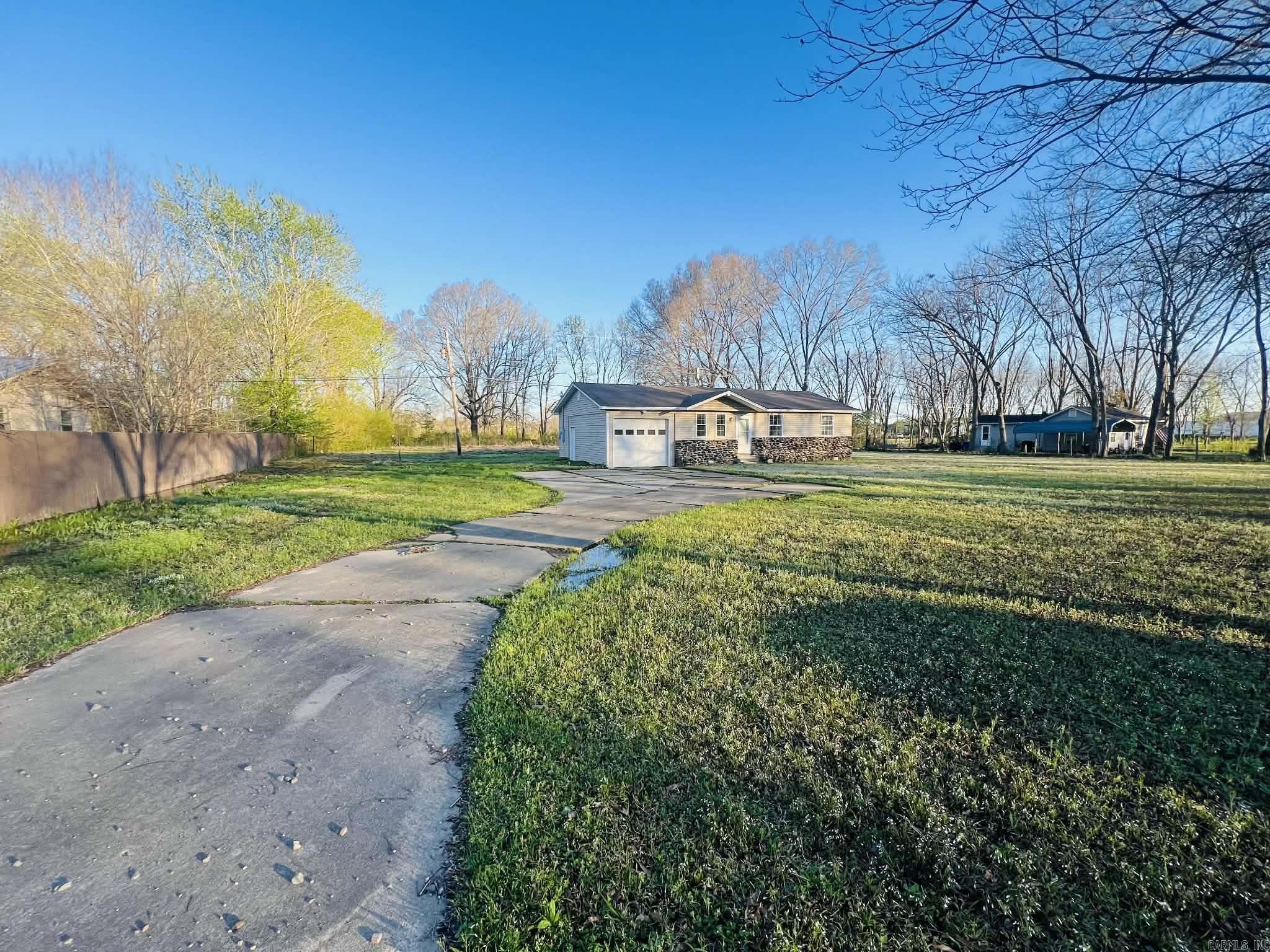 Investor opportunity in Beebe. This 3 bedroom 1.5 bath home sits on approximately 1.28 acres and offers plenty of potential for the right buyer. With a spacious lot and room to improve, this property could be a great project for investors, flippers, or buyers looking to build equity. The home offers a functional layout and a large yard with plenty of space for outdoor activities, storage, or future expansion. Located close to schools, shopping, and dining with easy access to surrounding areas. Property is a foreclosure and is being sold as is. Agents see remarks.