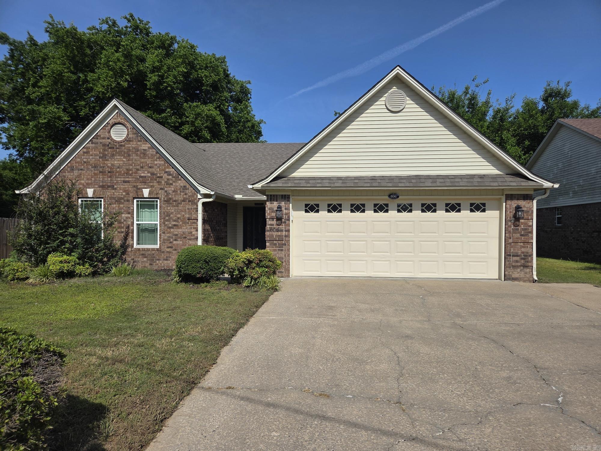 Very nice 3 bed, 2 bath with bonus & 2 car garage recently updated maintenance free home in downtown Searcy! This house was remodeled recently in 2022 & updates include NEW water heater, HVAC, windows, ceramic tile wood plank look floors, stove, dishwasher refrigerator, sinks, faucets, lighting, gutters, French drains, wood privacy fence, extra parking, garage motor, etc. It also has several walk-in closets, bay window, trey ceiling in Living room & dining area, gas log fireplace, LED accent lights, crown ceiling molding in all rooms, bonus room that could also be an office, game room or a 4th bedroom if doors & closet were added.