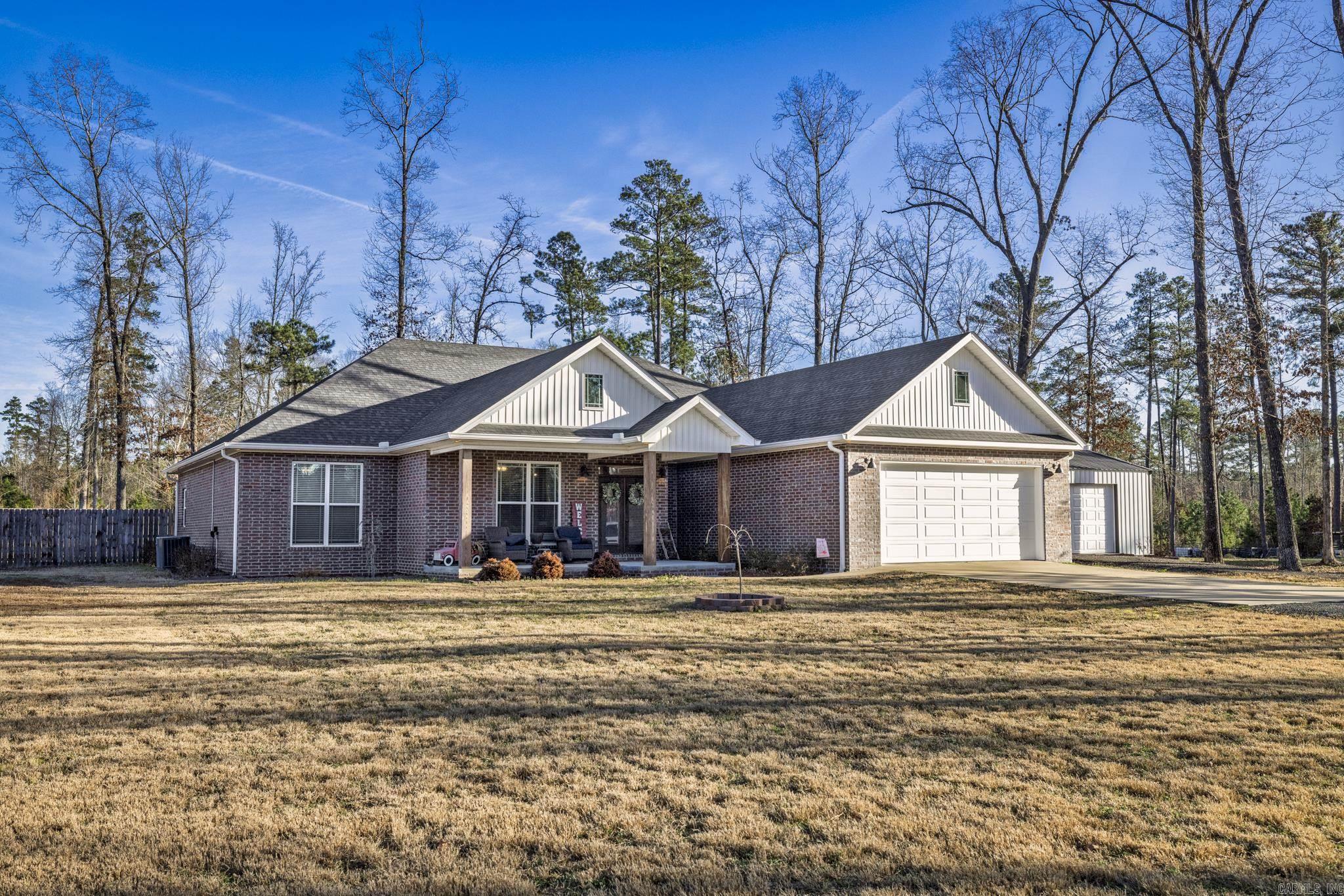 If you’ve been looking for space to spread out and truly feel at home, this one checks all the boxes! Nestled on a little over 3.5 acres in a highly desirable area, this 4-bedroom, 2-bath home offers the perfect mix of comfort, privacy, and room to grow. All bedrooms are all generously sized, making them perfect for family, guests, or even a home office. The master suite is a true retreat, featuring plenty of room to relax, master bath comes with a custom tiled shower, soaker bathtub, split vanities, and a large walk-in closet you’ll appreciate every day. The fenced backyard is ideal for kids, pets, or weekend gatherings. Need extra space for projects or hobbies? The 30x30 shop has you covered, plus there’s an additional storage building for all the extras. With wide-open acreage, functional outbuildings, and a layout designed for everyday living, this property offers the kind of space and freedom that’s hard to find. Welcome Home!!