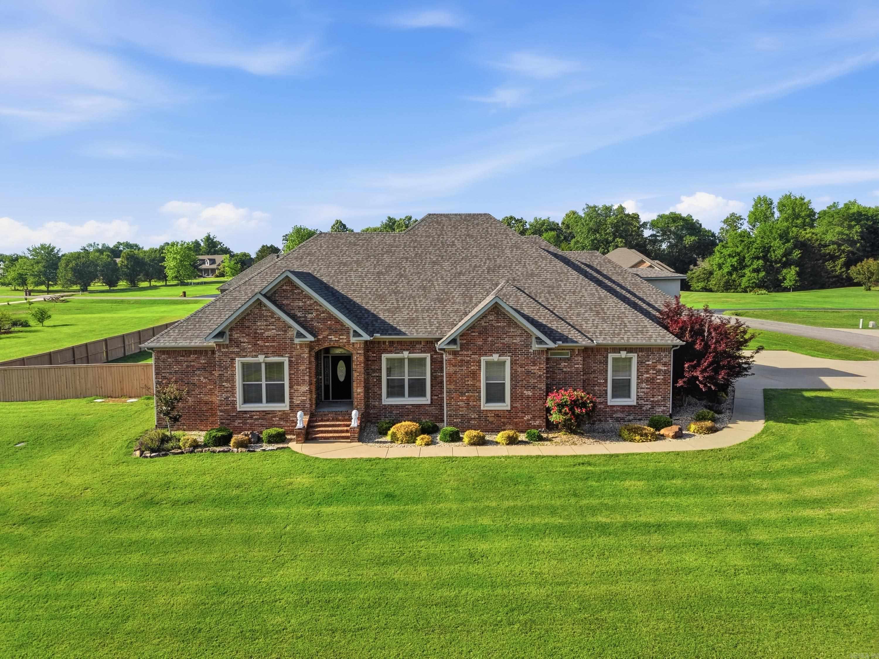 Welcome to 27 Winterberry in Greenbrier — a beautifully maintained home that truly looks and feels like new! Built in 2013, this exceptional property offers 3,258 square feet with 3 bedrooms, 2.5 baths, a dedicated office that could easily serve as a 4th bedroom, a spacious bonus room upstairs, and quality finishes throughout. Features include real wood flooring, tile in wet areas, fresh paint in select rooms, brand-new carpet in all bedrooms, 10-foot ceilings and built-in audio throughout. Designed for both everyday living and entertaining, the outdoor space features an inground pool with a new liner and convenient access to the half bath just off the pool area. Additional amenities include a NEW roof on both the home and shop - end of 2025, safe room, sprinkler system, gutters, alarm system capability, two hot water tanks, and a 3-car garage. A standout feature is the impressive 1,200 square foot heated and cooled shop complete with its own half bath and separate electric meter — perfect for hobbies, storage, a workshop, or entertaining space. This home offers the perfect blend of comfort, function, and luxury in one of Greenbrier’s most desirable areas!