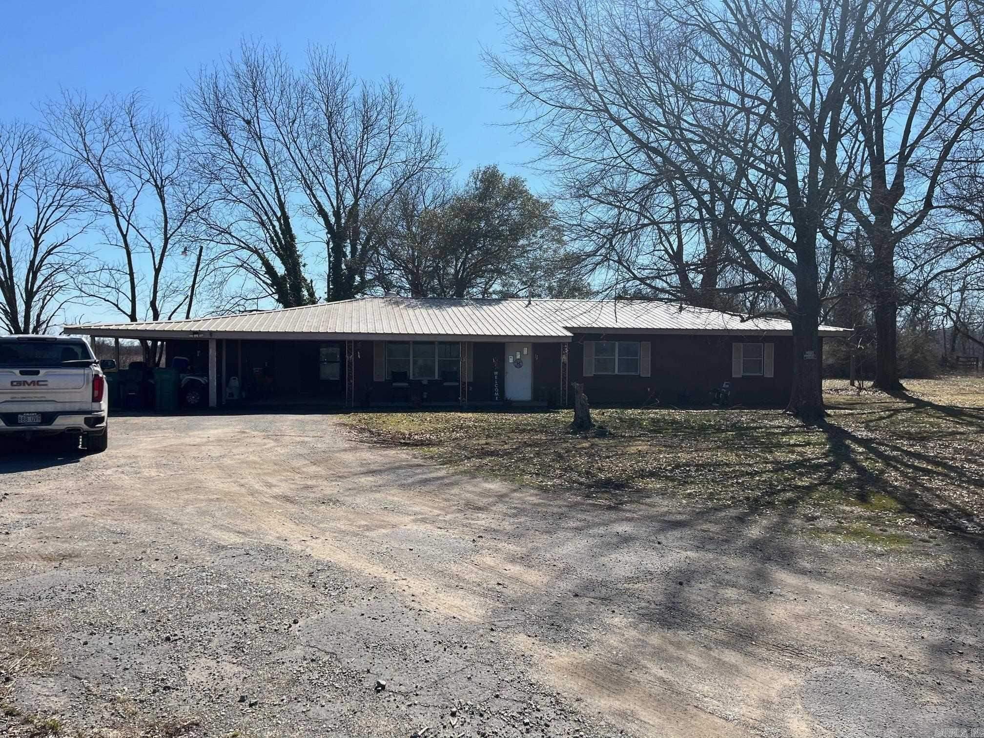 Discover your slice of paradise with this welcoming 1,600 square foot home located on 13 acres of fertile farmland in beautiful Pine Bluff, Arkansas. This property offers a harmonious blend of comfortable living and agricultural potential, making it perfect for families, hobby farmers, or those looking to escape to the serenity of rural life. Property Highlights: The property features a well-designed 1,600 square foot home that includes: - 3 generous bedrooms providing ample space for family or guests. - 2 full bathrooms offering modern conveniences and privacy for all. - A bright and airy living space, perfect for relaxing or entertaining. - An open kitchen - Expansive Farmland: The 13 acres of land is primarily cleared and ready for use, providing endless possibilities such as. - Crop production