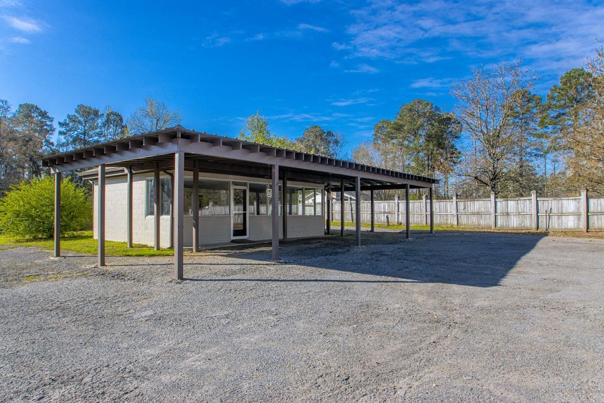 Don't miss this rare opportunity to own a piece of the East End community and stop throwing your money away on rent. This awesome, fully updated office space sits on a generous half-acre lot, offering you the chance to build equity while you work in a professional environment that is truly your own. The possibilities here are limitless; the expansive grounds provide ample room for additional ventures, such as hosting a food truck rental or expanding your business footprint. Whether you are looking for a dedicated corporate hub or a versatile investment property, the sky is the limit, so call us today to schedule your private appointment and secure your future. There is plenty of space to have an office and allow a food truck to rent some of the area. Lots of options.