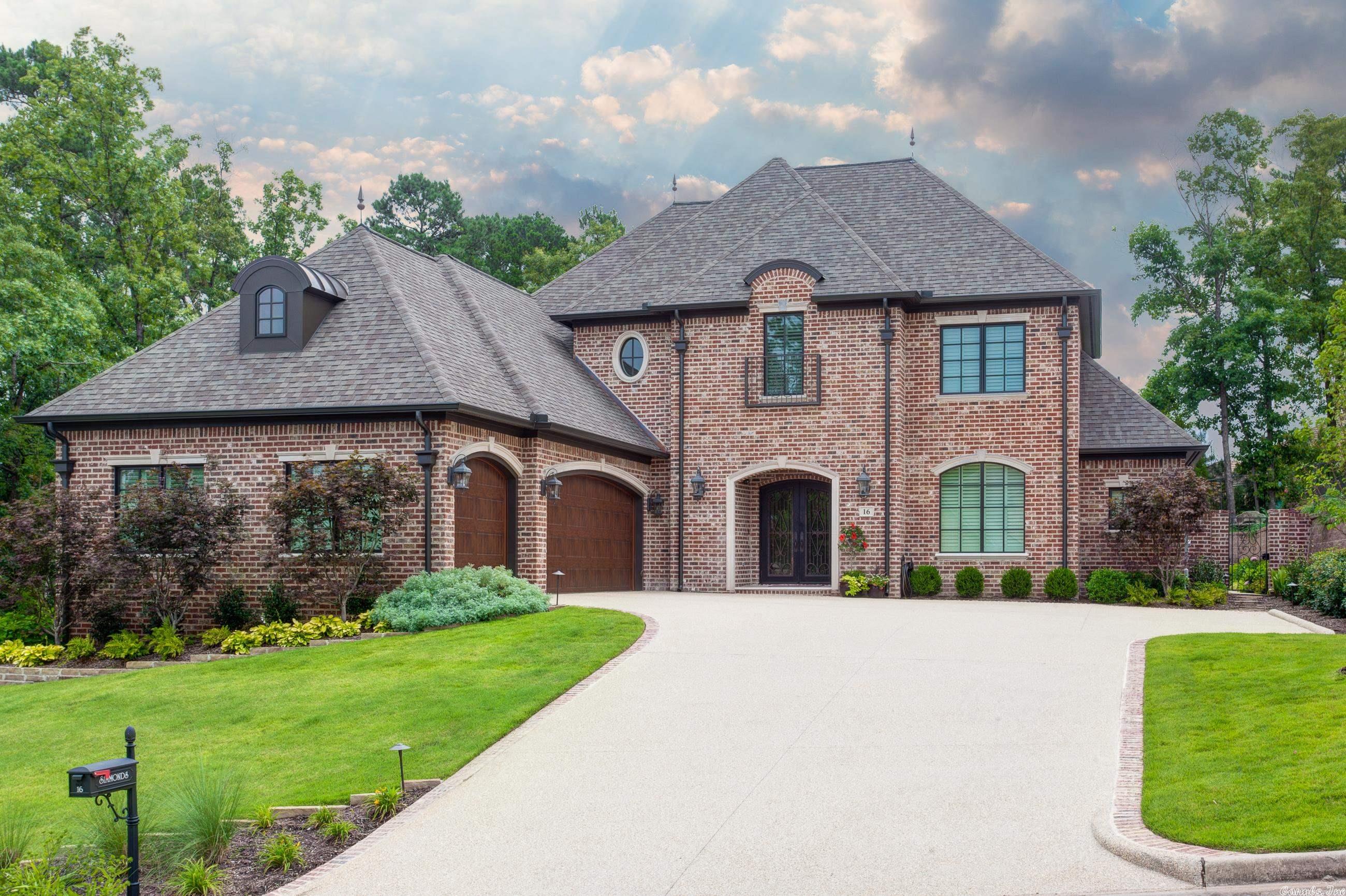 This exceptional home is situated in the highly desirable, Hickory Pointe neighborhood, convenient to all of West LR.  Custom built by Bill Parkinson this home features a gracious foyer, two living areas, lg open kitchen, formal dining, principal and guest en-suites all on the main level.  Upstairs features a central library/study, guest en-suite and well-appointed study or additional bedroom suite/with fireplace. The fabulous pool and patio area boast a well-equipped outdoor kitchen. Three car garage.