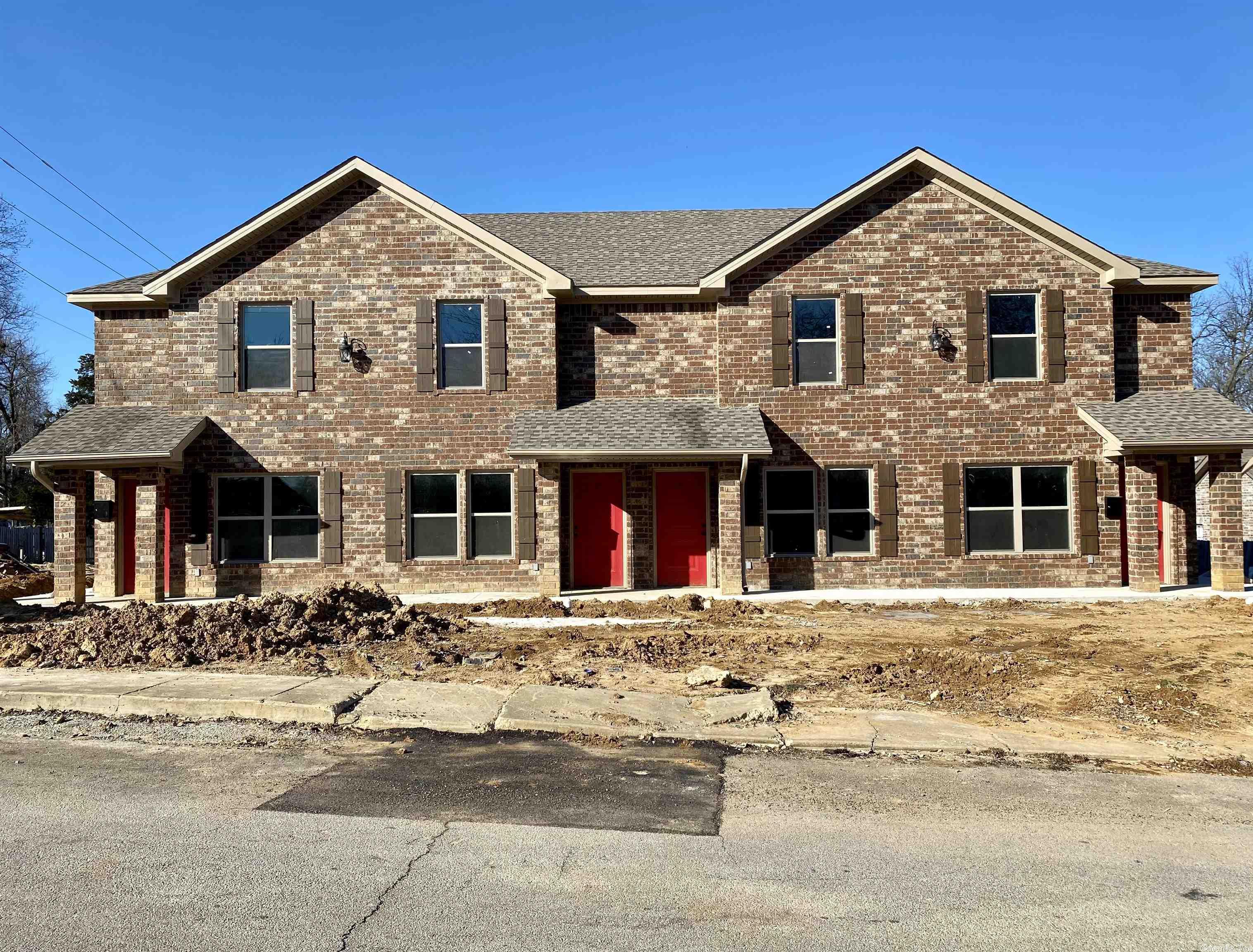 New construction quadplexes. Two bedroom, 1.5 baths. All brick exterior. Units feature granite countertops, stainless steel appliances, large laundry closet. Eight units total. Large corner lot.