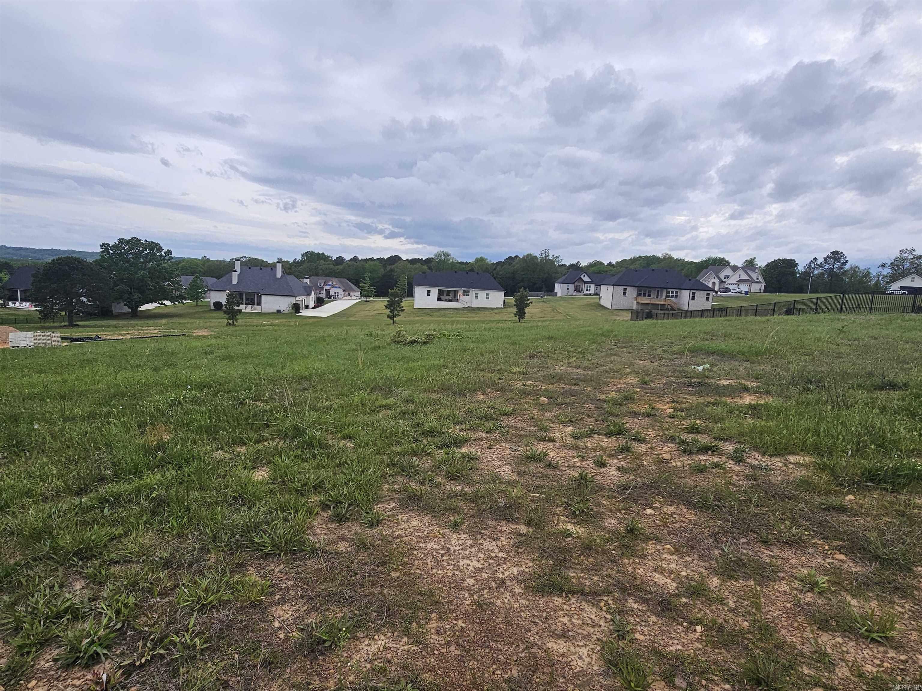 Opportunity to build a brand new custom home with Triple E Custom Homes in Greenbrier on these beautiful homesites that blend space, privacy, and convenience. Don’t miss your chance to secure your place in this sought-after location! Agents see remarks.