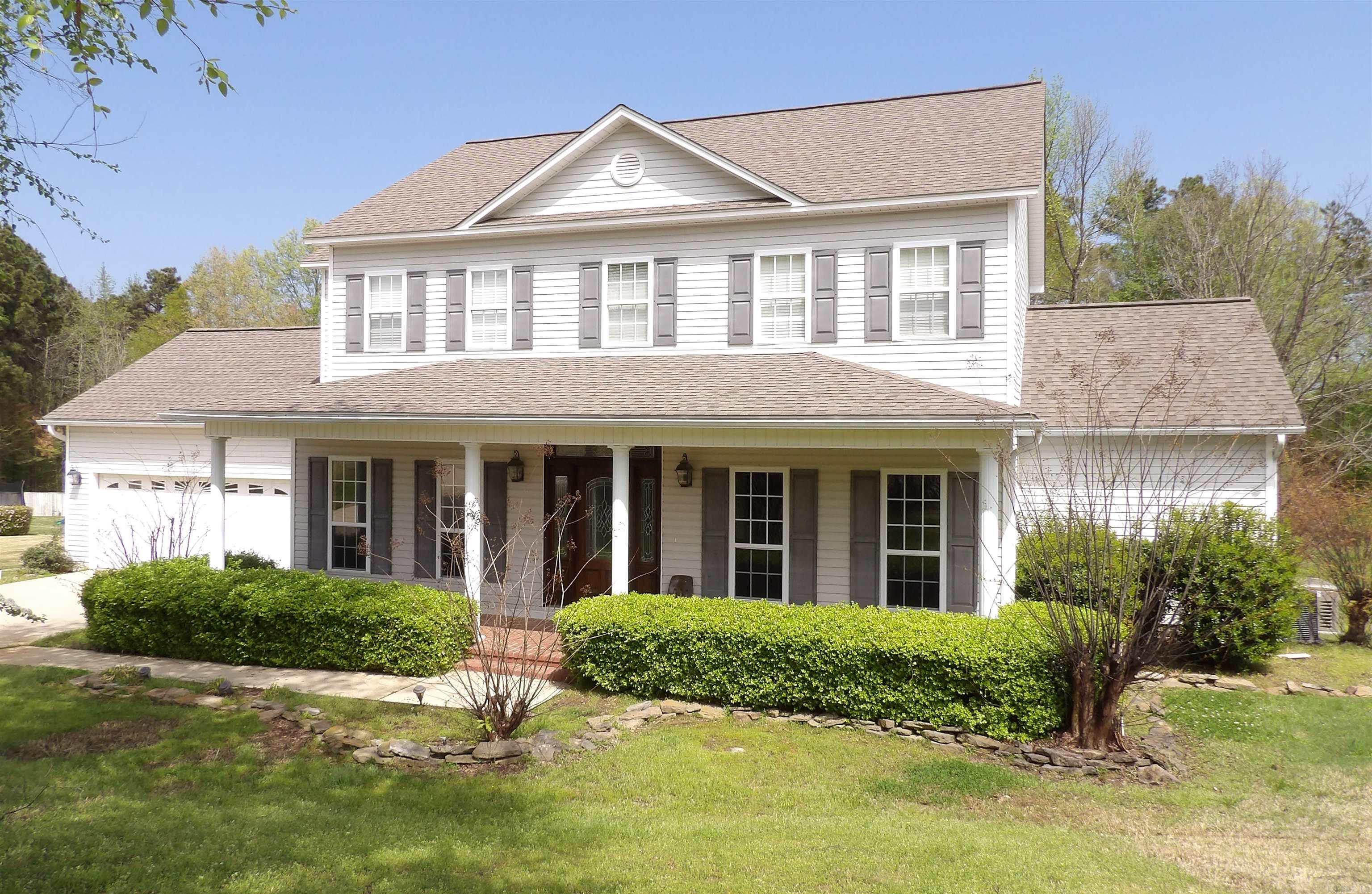 Seller is offering a $20K renovation allowance at closing!!  This beautiful and majestic 4-bedroom, 2.5-bath home sits on a peaceful hillside within golf-cart distance of the golf course. Loaded with extras—including a whole-house Kohler generator.  This property offers comfort, convenience, and peace of mind. Just minutes from downtown yet tucked away on a quiet, serene hillside, it delivers the perfect blend of privacy and accessibility.