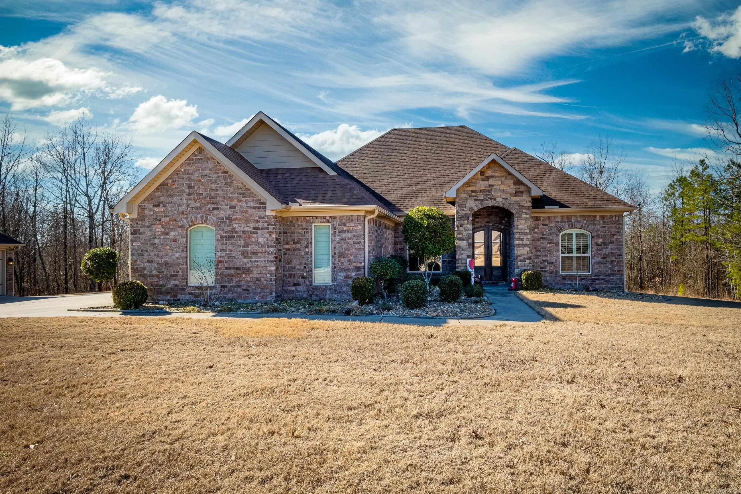Unique one level on 3 acres in gated Westcliffe! 4 bedrooms and 3 full baths, open floor plan, hardwood and new carpet throughout, acreage is level and fully fenced! Each bedroom includes a large walk-in closet, and enjoy complete privacy with this lot! Did we mention the 3 car side load garage, and the 3 car bay shop (6 bays total)! Built in workshop and tons of attic storage as well! Generator conveys and Roof replaced 2022!