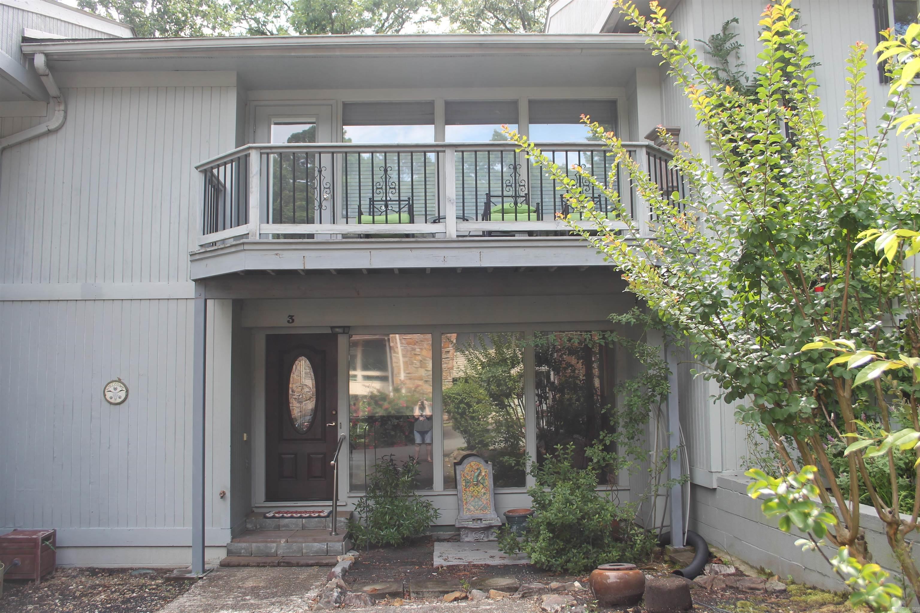Discover one of Hot Springs Village's best-kept secrets—Castellon Courts on beautiful Lake DeSoto. This highly sought-after townhome community offers a rare combination of lakefront living, low-maintenance ownership, and an active outdoor lifestyle. Residents and their guests enjoy direct access to Lake DeSoto, the convenience of walking to Waypoint Marina, and easy access to more than 30 miles of scenic walking and nature trails throughout the Village. Whether you're enjoying an evening paddle, a morning walk along the shoreline, or simply relaxing on your patio surrounded by mature trees, Castellon Courts offers a lifestyle that's difficult to match.  Owner says "sell AS-IS, Where-is".  FURNITURE CONVEYS!  Move right in--or use as a short or long term investment!  Residents and their guests may enjoy the many amenities of this townhome community--as well as those of Hot Springs Village:  11 lakes, two marinas, 9 golf courses, fitness center with indoor pool & sauna, outdoor pool, tennis, pickleball, basketball & over 200 clubs, covering the interests of most everyone!  Come visit and see for yourself!  More Hot Springs Village information at www.ExploreTheVillage.com.