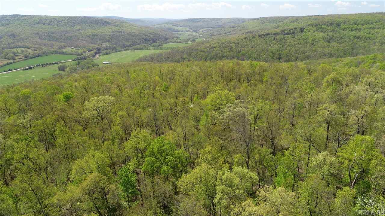 Dogwood Ridge Cabin is a stunning get-away you do not find very often. Immerse yourself in the beauty, tranquility, and privacy of the Ozark hill country with this incredible off-grid cabin situated in middle of the hardwood flats overlooking the Osage valley. Looking over the lush wooded acreage is a well built 420 sq ft cabin with all you need to make it! This rustic gem is loaded with features including a metal roof, water tank, solar panels with LED lights, propane heat and cook stove.
