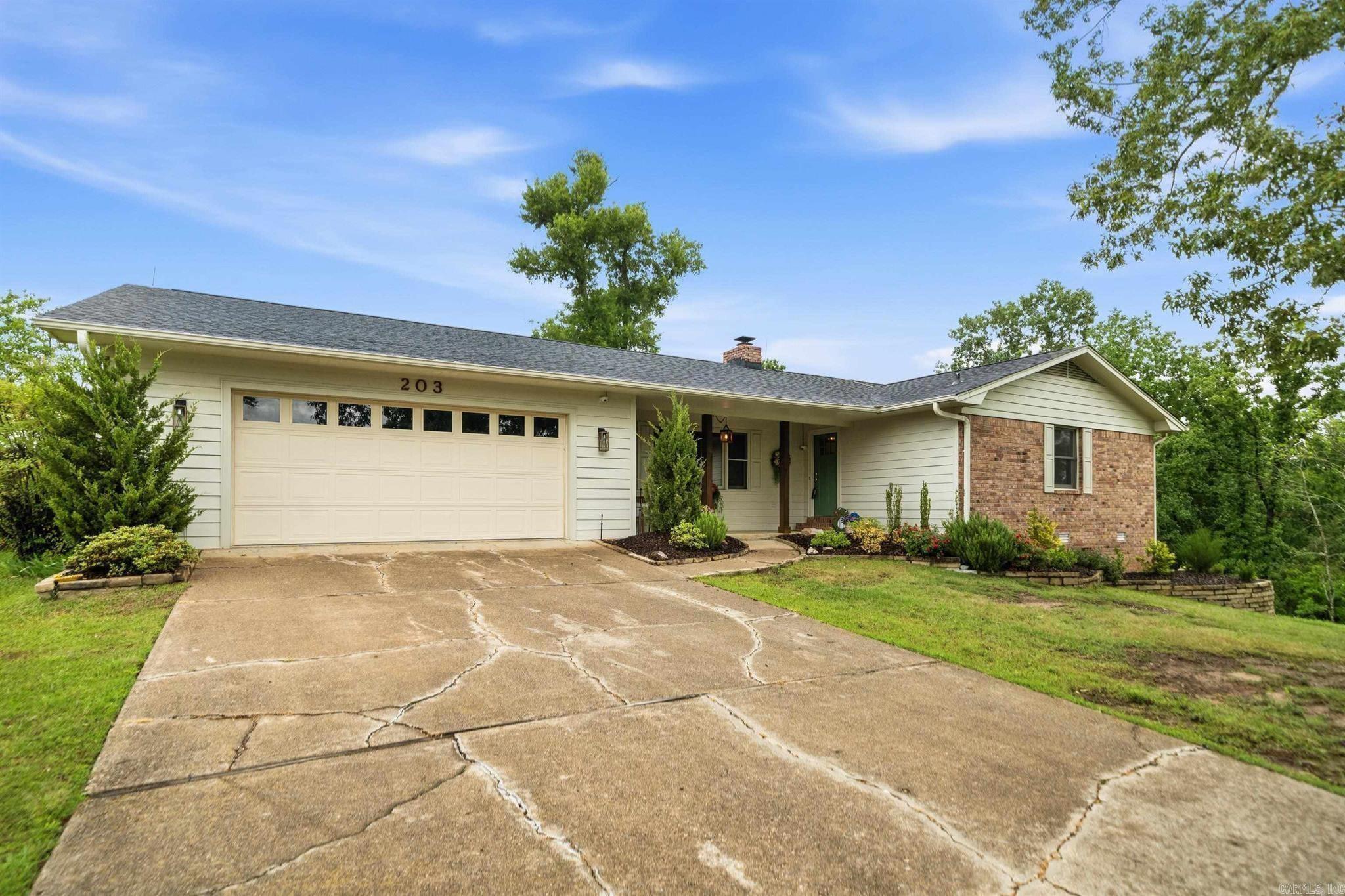 You’ve been searching for this one! This beautiful 3-BR, 2-BA move-in ready home is tucked away on a quiet dead-end street and has been exceptionally well maintained. From the moment you walk in, you’ll notice the care and pride of ownership throughout. Beautiful vinyl plank flooring flows through most of the home, creating a warm and inviting feel. The spacious kitchen offers plenty of room for everyone to gather and cook together with a connected dining area perfect for everyday living. All bedrooms are generously sized, and the primary suite features a beautifully updated bathroom with a step-in shower and new countertops. Every bedroom includes a walk-in closet, and the home offers abundant storage throughout. New roof 2023.  The large office space shares the laundry area and features built-ins that make it ideal for a home office, hobby room, or craft space.  Step outside and fall in love with the backyard retreat. The large newly refinished deck and peaceful koi pond create the perfect setting to relax and unwind. Situated on two combined lots totaling approximately 0.55 acres the property also includes a 20x16 storage building and plenty of room to grow.