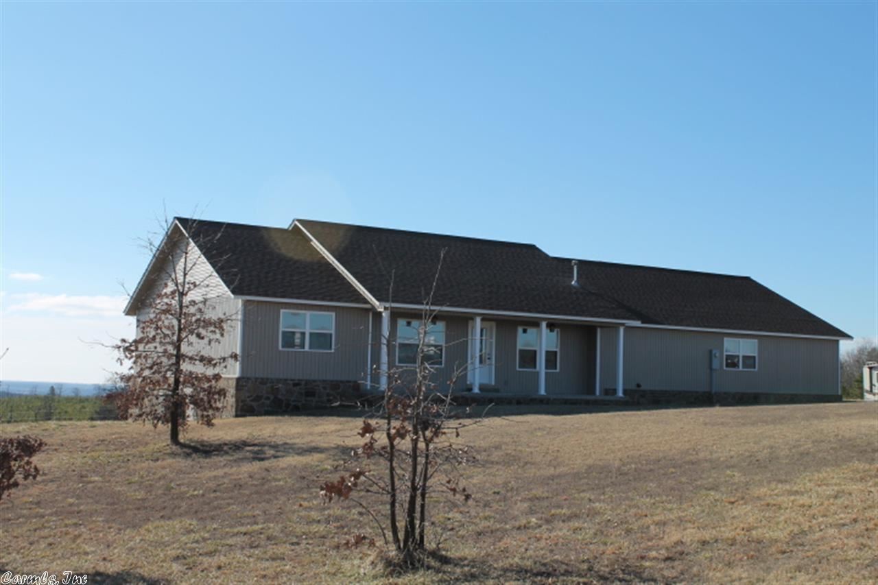 Beautiful custom built home on 10.2 acres. The property is already cleared and ready to fence. It has amazing views of Quitman to the south. The great room has a pellet stove for the cold winter nights. The kitchen has a large island with lots of cabinets. The master bedroom has a beautiful tray ceiling, a large walking closet and access to the back porch. There is a large storage area underneath the house. Some of the furniture, appliances, tractor, mower, etc. are available for purchase.