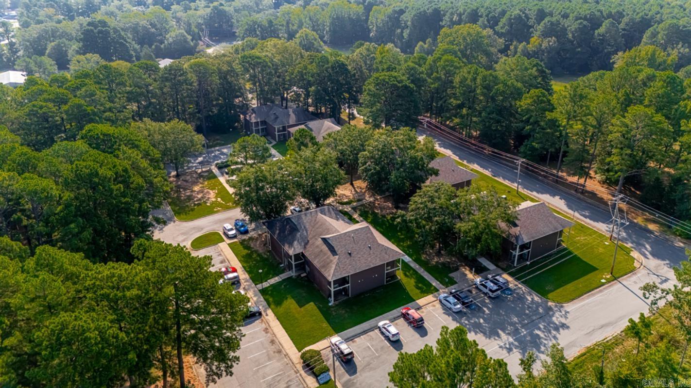 Westside Village Apartments is a well-maintained, 40-unit garden-style community situated on ±3.81 acres at 1810 Bishop Road in Bryant, AR—one of Central Arkansas’ fastest-growing suburbs with immediate access to I-30, Bishop Park, and the Alcoa/Reynolds retail corridor. The property features a balanced unit mix of 16 one-bedroom flats (±646 SF) and 24 two-bedroom flats (±834 SF), all-electric systems, central HVAC, tenant paid water, on-site laundry, and proximity to Bryant’s highly rated school district, making it a proven choice for stable workforce housing. Current market rents (~$735 for 1BR; ~$805–$855 for 2BR with washer/dryer connections) remain below Bryant’s averages (˜$942 for 1BR; ˜$1,182 for 2BR), presenting immediate mark-to-market growth potential. Recent ownership has invested in significant upgrades, including the installation of stone countertops in most kitchens, replacement of the majority of HVAC units and water heaters, new ceiling fans, and updated appliances—positioning the property for both strong in-place cash flow and additional value-add upside.